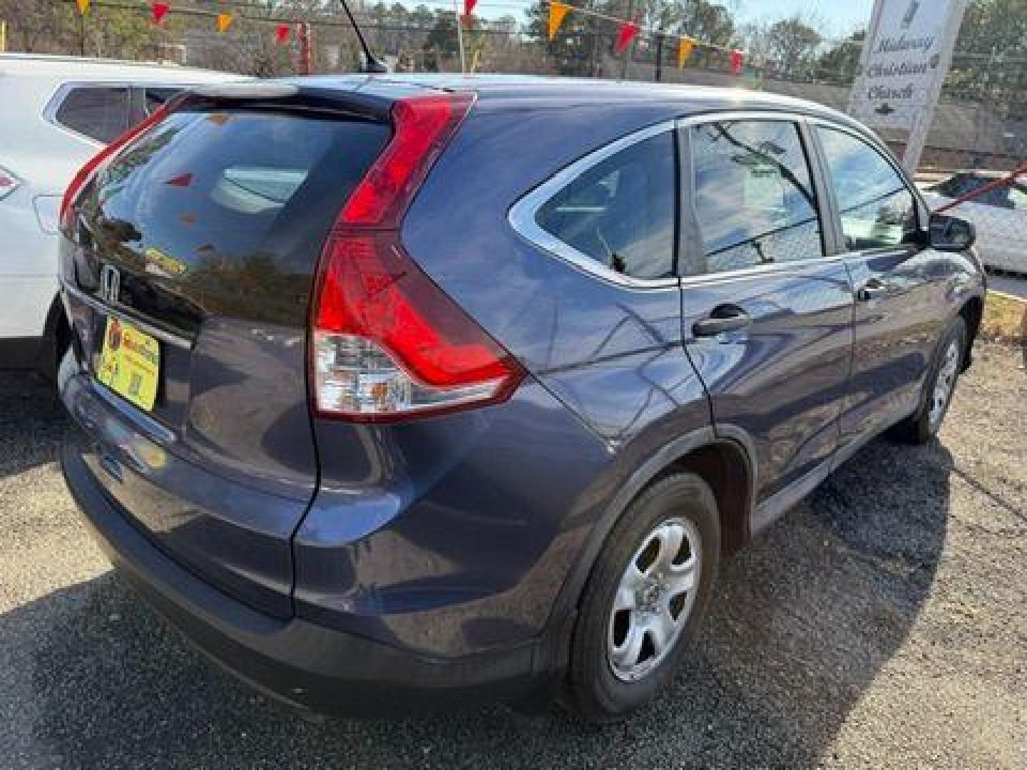 2014 Blue Honda CR-V LX 2WD 5-Speed AT (2HKRM3H35EH) with an 2.4L L4 DOHC 16V engine, 5-Speed Automatic transmission, located at 1806 Veterans Memorial Hwy SW, Austell, GA, 30168, (770) 944-9558, 33.817959, -84.606987 - Photo#6