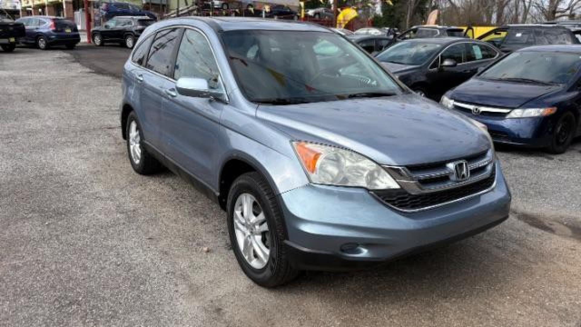 2011 Blue Honda CR-V EX-L 4WD 5-Speed AT (5J6RE4H76BL) with an 2.4L L4 DOHC 16V engine, 5-Speed Automatic transmission, located at 1806 Veterans Memorial Hwy SW, Austell, GA, 30168, (770) 944-9558, 33.817959, -84.606987 - Photo#2