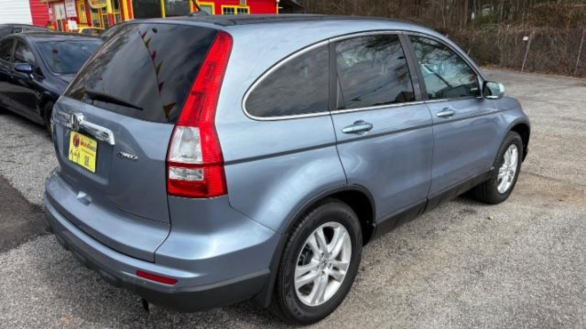 2011 Blue Honda CR-V EX-L 4WD 5-Speed AT (5J6RE4H76BL) with an 2.4L L4 DOHC 16V engine, 5-Speed Automatic transmission, located at 1806 Veterans Memorial Hwy SW, Austell, GA, 30168, (770) 944-9558, 33.817959, -84.606987 - Photo#3