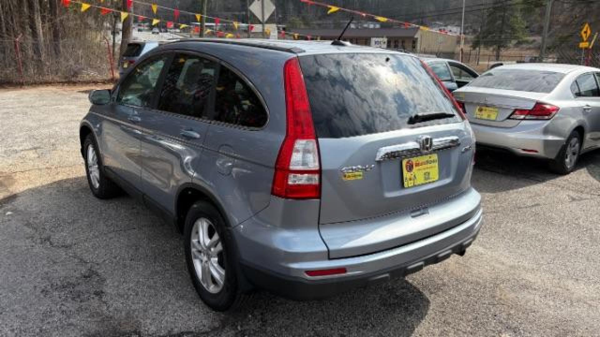 2011 Blue Honda CR-V EX-L 4WD 5-Speed AT (5J6RE4H76BL) with an 2.4L L4 DOHC 16V engine, 5-Speed Automatic transmission, located at 1806 Veterans Memorial Hwy SW, Austell, GA, 30168, (770) 944-9558, 33.817959, -84.606987 - Photo#5