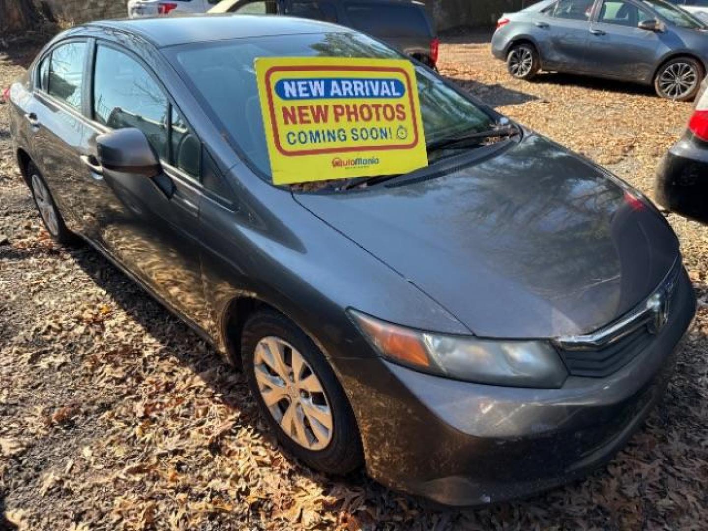 2012 Gray Honda Civic LX Sedan 5-Speed AT (19XFB2F59CE) with an 1.8L L4 SOHC 16V engine, 5-Speed Automatic transmission, located at 1806 Veterans Memorial Hwy SW, Austell, GA, 30168, (770) 944-9558, 33.817959, -84.606987 - Photo#0