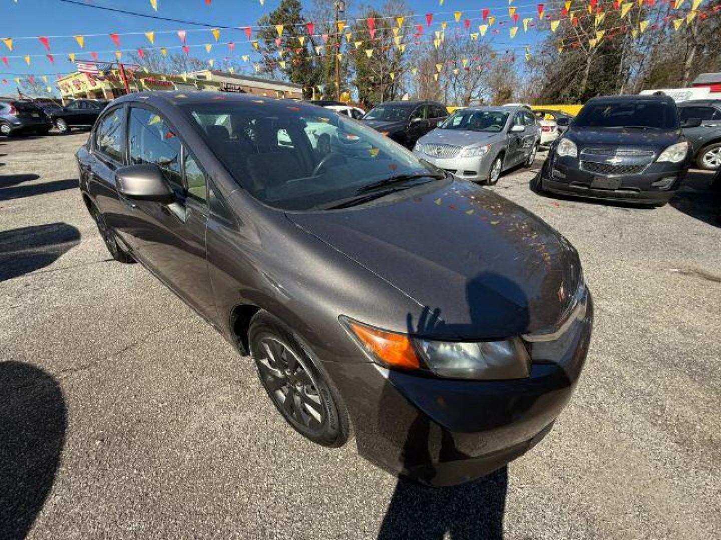 2012 Gray Honda Civic LX Sedan 5-Speed AT (19XFB2F59CE) with an 1.8L L4 SOHC 16V engine, 5-Speed Automatic transmission, located at 1806 Veterans Memorial Hwy SW, Austell, GA, 30168, (770) 944-9558, 33.817959, -84.606987 - Photo#9