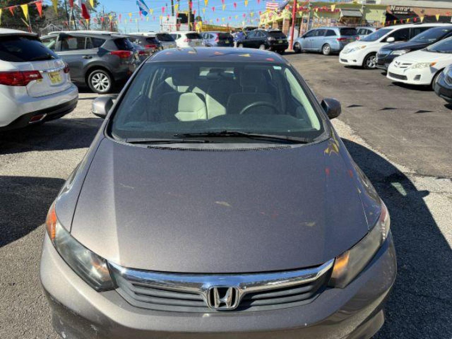 2012 Gray Honda Civic LX Sedan 5-Speed AT (19XFB2F59CE) with an 1.8L L4 SOHC 16V engine, 5-Speed Automatic transmission, located at 1806 Veterans Memorial Hwy SW, Austell, GA, 30168, (770) 944-9558, 33.817959, -84.606987 - Photo#10