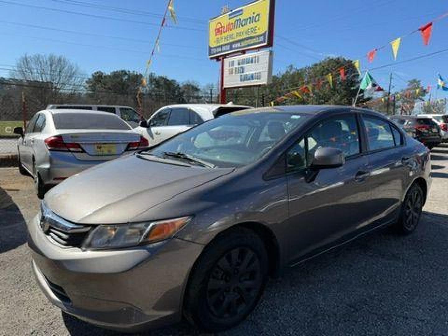 2012 Gray Honda Civic LX Sedan 5-Speed AT (19XFB2F59CE) with an 1.8L L4 SOHC 16V engine, 5-Speed Automatic transmission, located at 1806 Veterans Memorial Hwy SW, Austell, GA, 30168, (770) 944-9558, 33.817959, -84.606987 - Photo#0