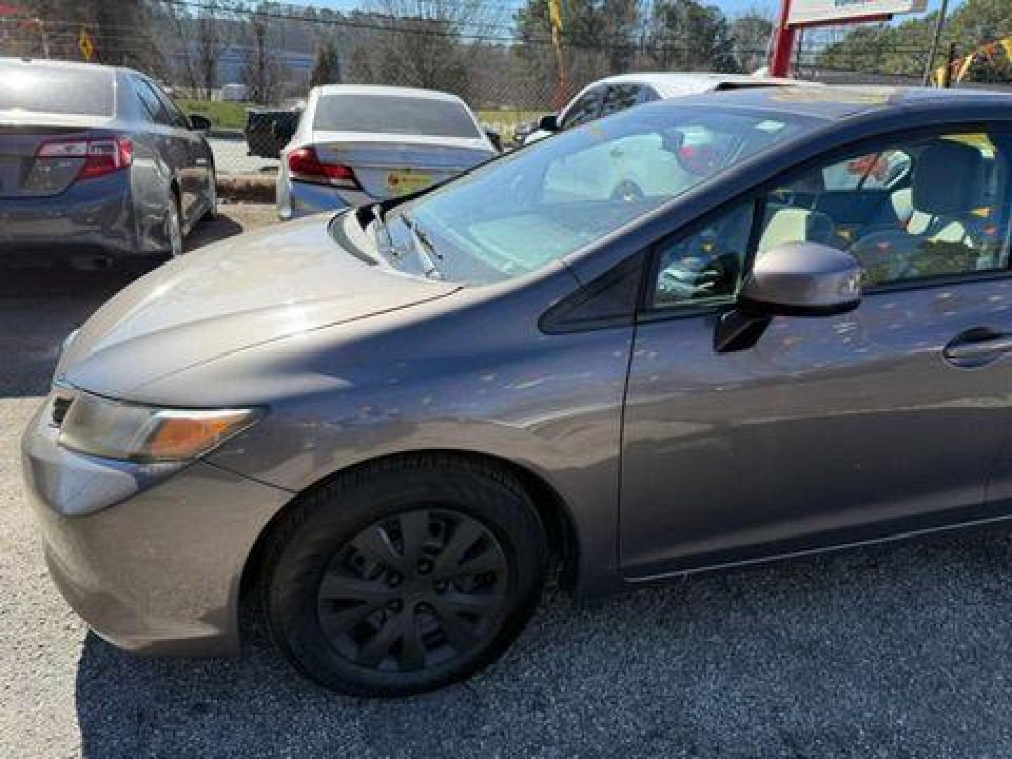 2012 Gray Honda Civic LX Sedan 5-Speed AT (19XFB2F59CE) with an 1.8L L4 SOHC 16V engine, 5-Speed Automatic transmission, located at 1806 Veterans Memorial Hwy SW, Austell, GA, 30168, (770) 944-9558, 33.817959, -84.606987 - Photo#1