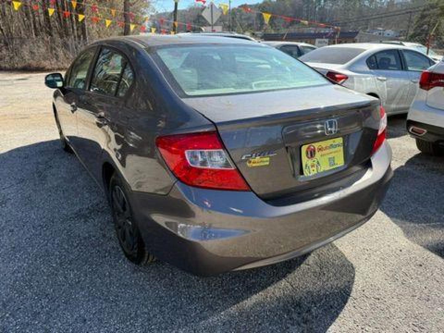 2012 Gray Honda Civic LX Sedan 5-Speed AT (19XFB2F59CE) with an 1.8L L4 SOHC 16V engine, 5-Speed Automatic transmission, located at 1806 Veterans Memorial Hwy SW, Austell, GA, 30168, (770) 944-9558, 33.817959, -84.606987 - Photo#3