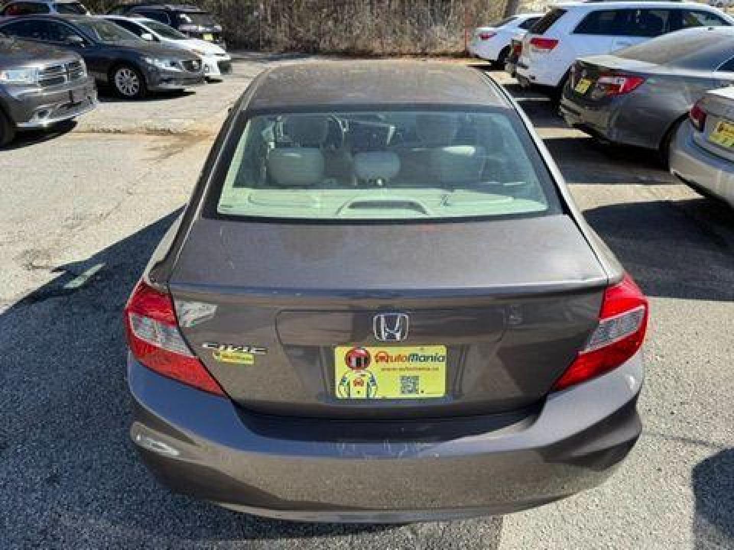 2012 Gray Honda Civic LX Sedan 5-Speed AT (19XFB2F59CE) with an 1.8L L4 SOHC 16V engine, 5-Speed Automatic transmission, located at 1806 Veterans Memorial Hwy SW, Austell, GA, 30168, (770) 944-9558, 33.817959, -84.606987 - Photo#4