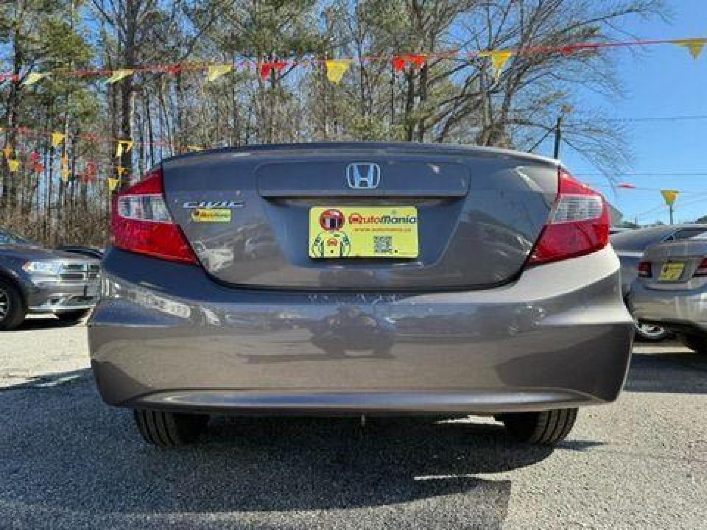 2012 Gray Honda Civic LX Sedan 5-Speed AT (19XFB2F59CE) with an 1.8L L4 SOHC 16V engine, 5-Speed Automatic transmission, located at 1806 Veterans Memorial Hwy SW, Austell, GA, 30168, (770) 944-9558, 33.817959, -84.606987 - Photo#5