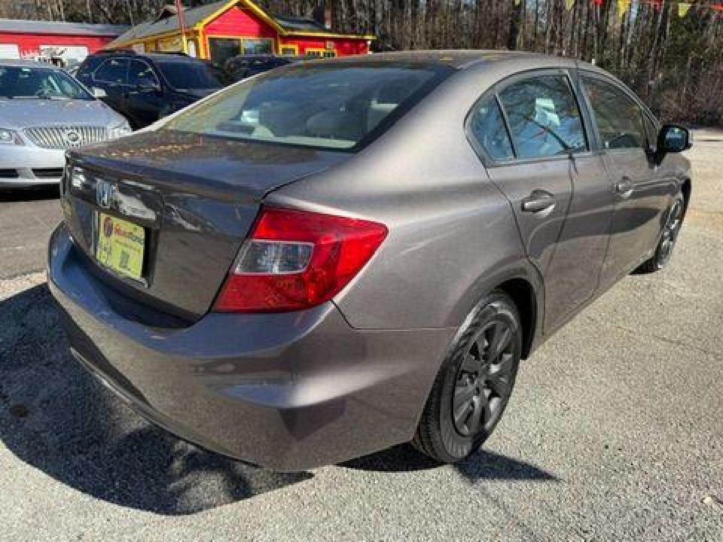 2012 Gray Honda Civic LX Sedan 5-Speed AT (19XFB2F59CE) with an 1.8L L4 SOHC 16V engine, 5-Speed Automatic transmission, located at 1806 Veterans Memorial Hwy SW, Austell, GA, 30168, (770) 944-9558, 33.817959, -84.606987 - Photo#6