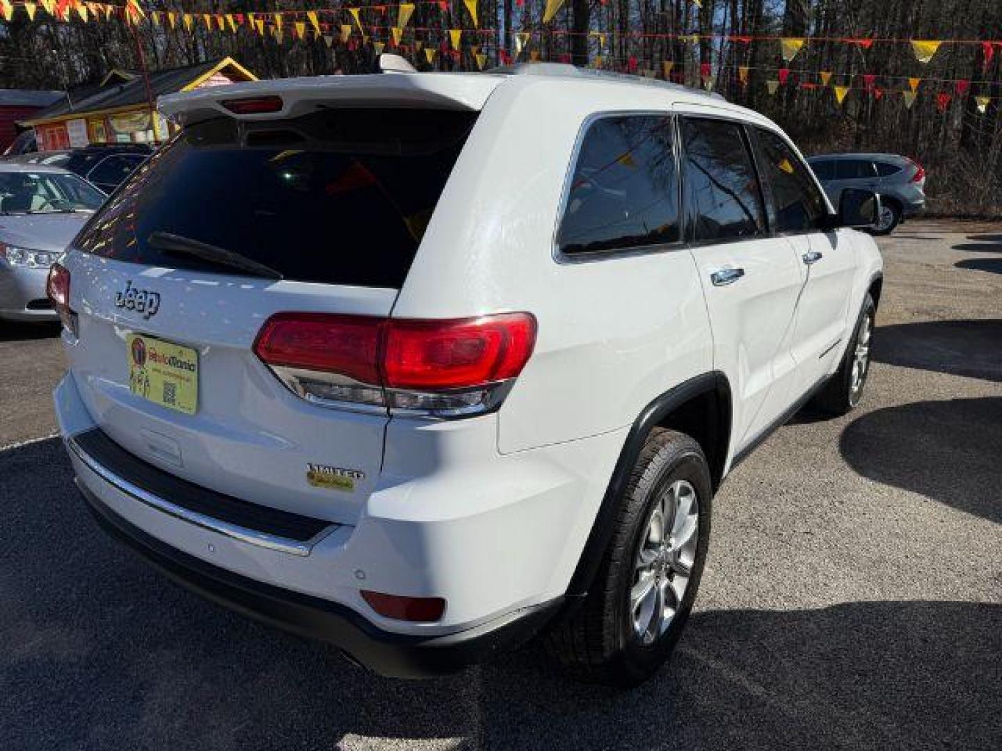 2016 White Jeep Grand Cherokee Limited 2WD (1C4RJEBG9GC) with an 3.6L V6 DOHC 24V engine, 8-Speed Automatic transmission, located at 1806 Veterans Memorial Hwy SW, Austell, GA, 30168, (770) 944-9558, 33.817959, -84.606987 - Photo#8