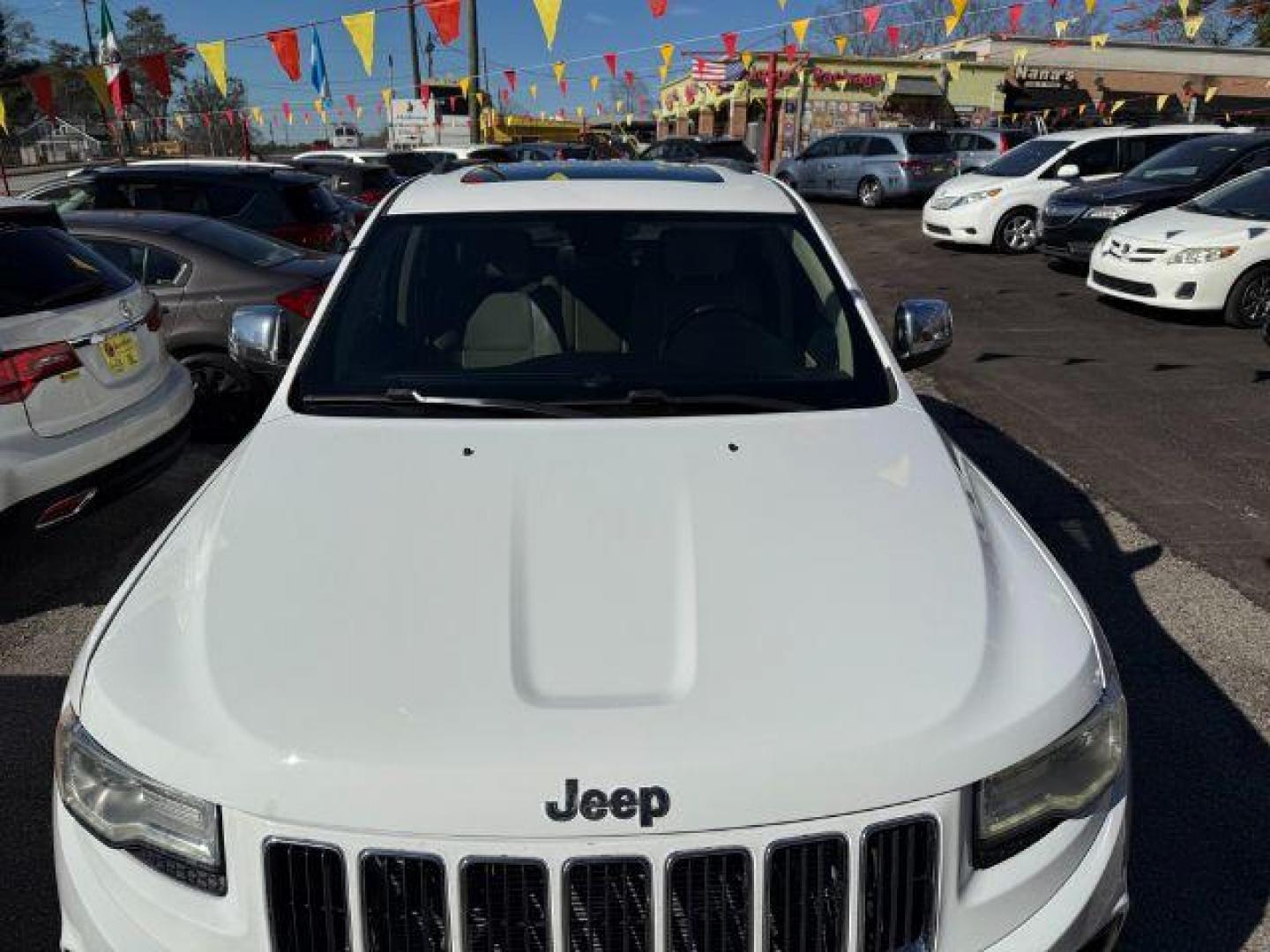 2016 White Jeep Grand Cherokee Limited 2WD (1C4RJEBG9GC) with an 3.6L V6 DOHC 24V engine, 8-Speed Automatic transmission, located at 1806 Veterans Memorial Hwy SW, Austell, GA, 30168, (770) 944-9558, 33.817959, -84.606987 - Photo#13