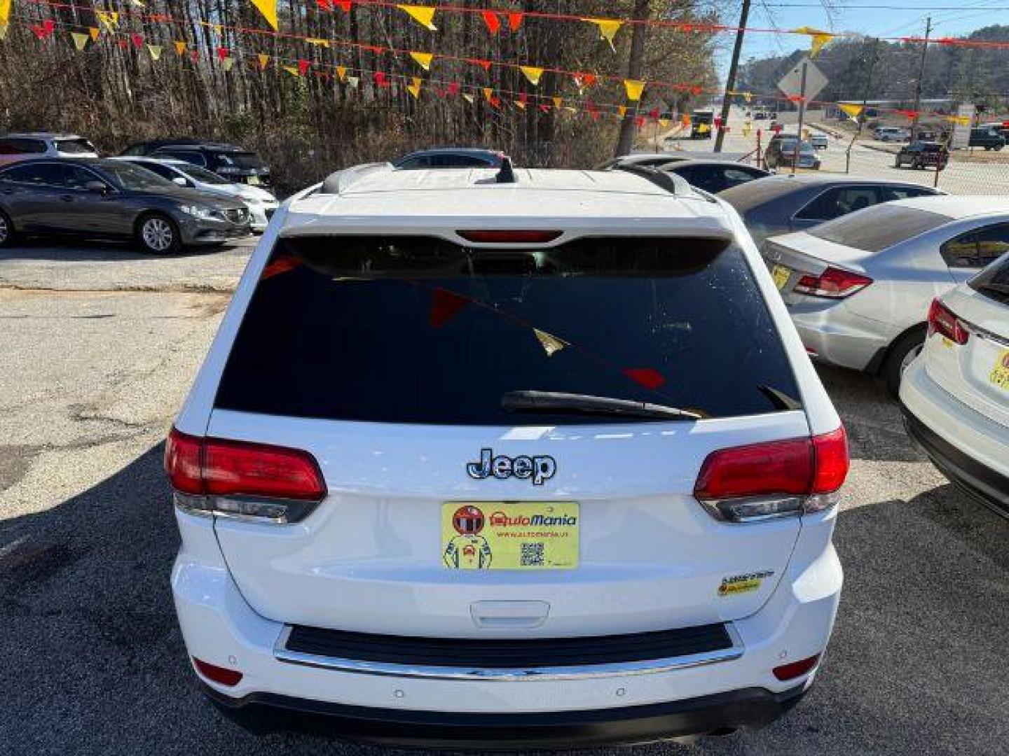 2016 White Jeep Grand Cherokee Limited 2WD (1C4RJEBG9GC) with an 3.6L V6 DOHC 24V engine, 8-Speed Automatic transmission, located at 1806 Veterans Memorial Hwy SW, Austell, GA, 30168, (770) 944-9558, 33.817959, -84.606987 - Photo#6