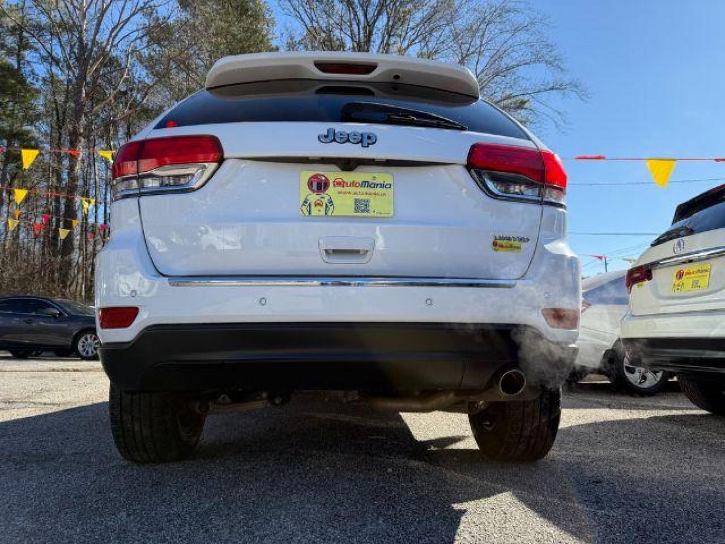 2016 White Jeep Grand Cherokee Limited 2WD (1C4RJEBG9GC) with an 3.6L V6 DOHC 24V engine, 8-Speed Automatic transmission, located at 1806 Veterans Memorial Hwy SW, Austell, GA, 30168, (770) 944-9558, 33.817959, -84.606987 - Photo#7