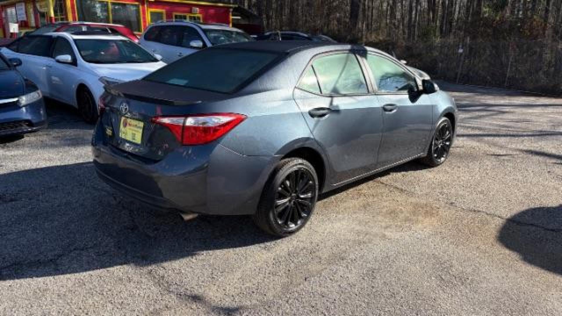 2015 Blue Toyota Corolla S Plus CVT (2T1BURHE0FC) with an 1.8L L4 DOHC 16V engine, Continuously Variable Transmission transmission, located at 1806 Veterans Memorial Hwy SW, Austell, GA, 30168, (770) 944-9558, 33.817959, -84.606987 - Photo#4