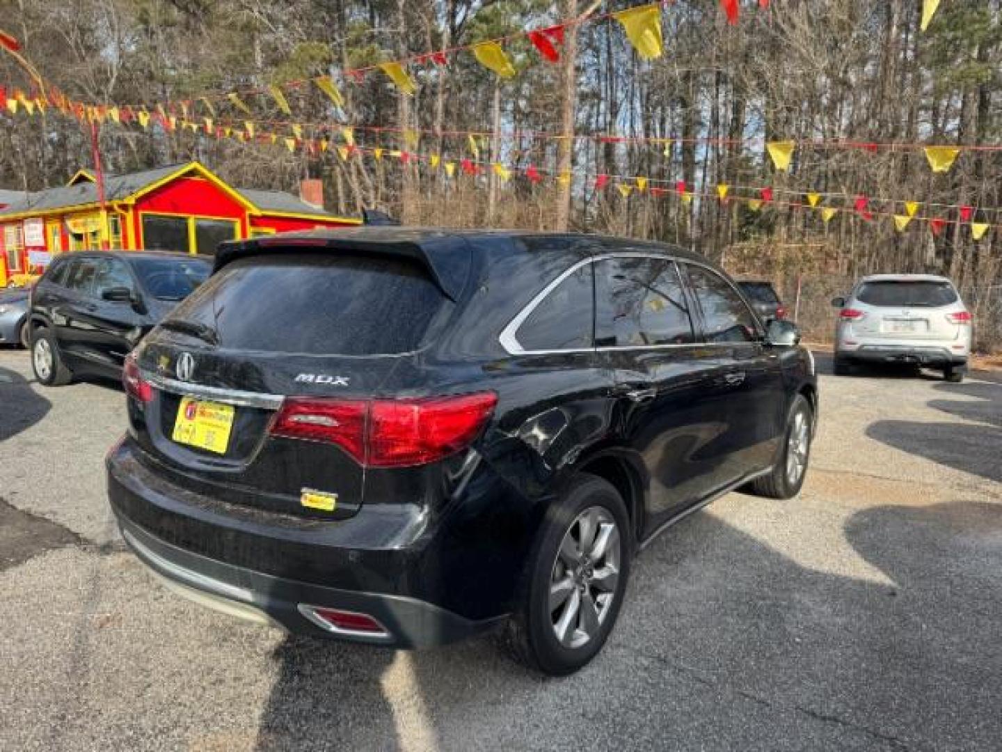 2016 Black Acura MDX 9-Spd AT SH-AWD w/Advance and Entertainment (5FRYD4H99GB) with an 3.5L V6 SOHC 24V engine, 9-Speed Automatic transmission, located at 1806 Veterans Memorial Hwy SW, Austell, GA, 30168, (770) 944-9558, 33.817959, -84.606987 - Photo#3