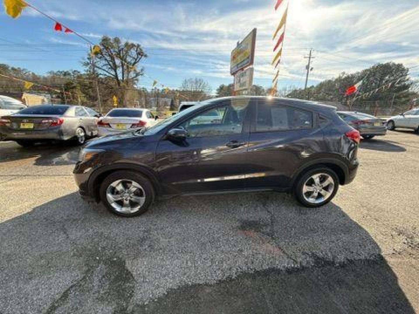 2017 Gray Honda HR-V EX 2WD CVT (3CZRU5H58HM) with an 1.8L L4 DOHC 16V engine, Continuously Variable Transmission transmission, located at 1806 Veterans Memorial Hwy SW, Austell, GA, 30168, (770) 944-9558, 33.817959, -84.606987 - Photo#4