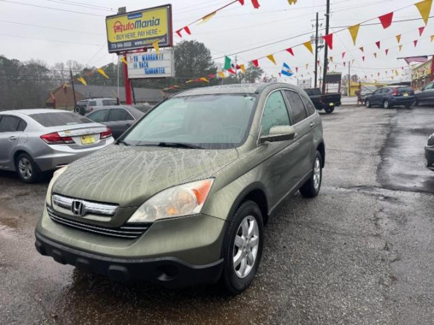 2012 Green Honda CR-V EX-L 2WD 5-Speed AT (JHLRM3H76CC) with an 2.4L L4 DOHC 16V engine, 5-Speed Automatic transmission, located at 1806 Veterans Memorial Hwy SW, Austell, GA, 30168, (770) 944-9558, 33.817959, -84.606987 - Photo#0