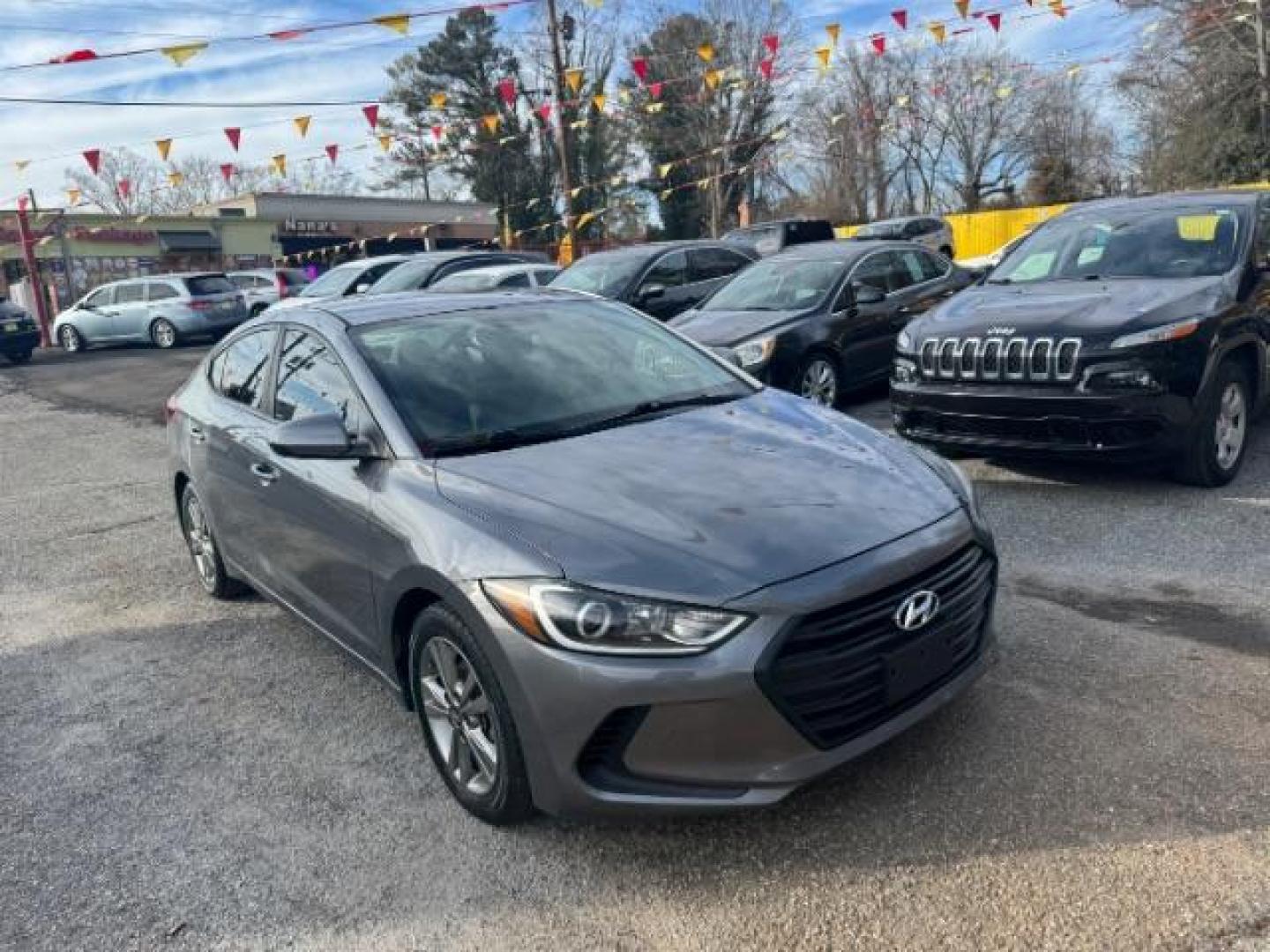 2018 Gray Hyundai Elantra Limited (5NPD84LF3JH) with an 1.8L L4 DOHC 16V engine, 6-Speed Automatic transmission, located at 1806 Veterans Memorial Hwy SW, Austell, GA, 30168, (770) 944-9558, 33.817959, -84.606987 - Photo#2