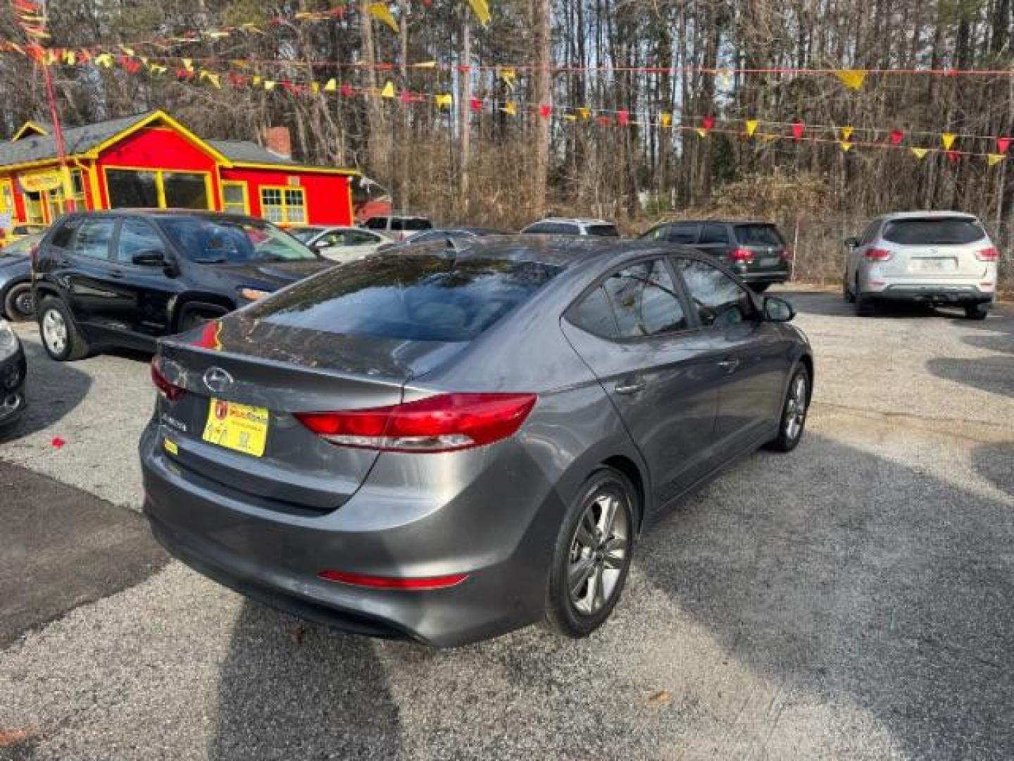 2018 Gray Hyundai Elantra Limited (5NPD84LF3JH) with an 1.8L L4 DOHC 16V engine, 6-Speed Automatic transmission, located at 1806 Veterans Memorial Hwy SW, Austell, GA, 30168, (770) 944-9558, 33.817959, -84.606987 - Photo#4