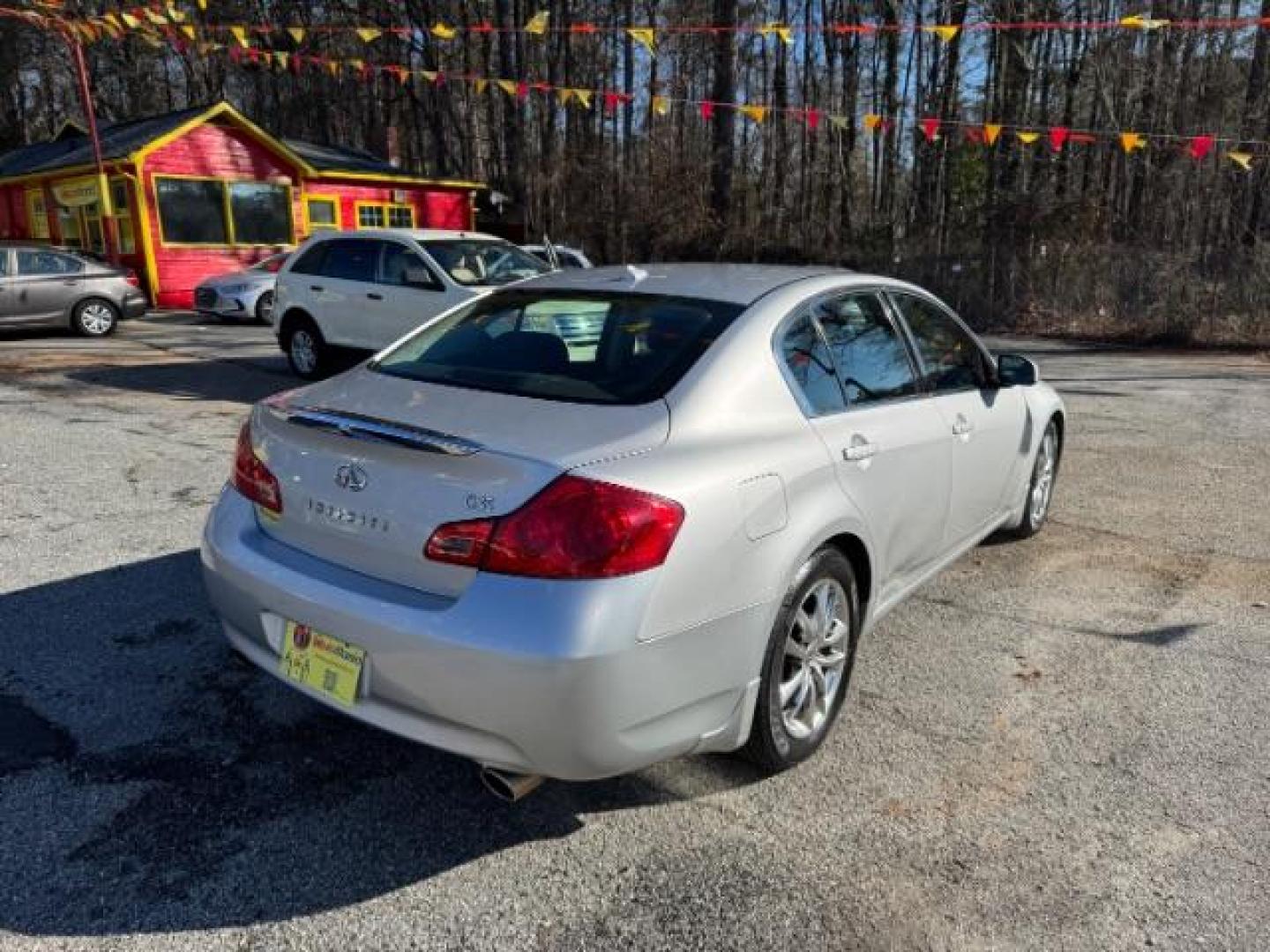 2008 Silver Infiniti G35 Journey (JNKBV61E58M) with an 3.5L V6 DOHC 24V engine, 5-Speed Automatic transmission, located at 1806 Veterans Memorial Hwy SW, Austell, GA, 30168, (770) 944-9558, 33.817959, -84.606987 - Photo#2