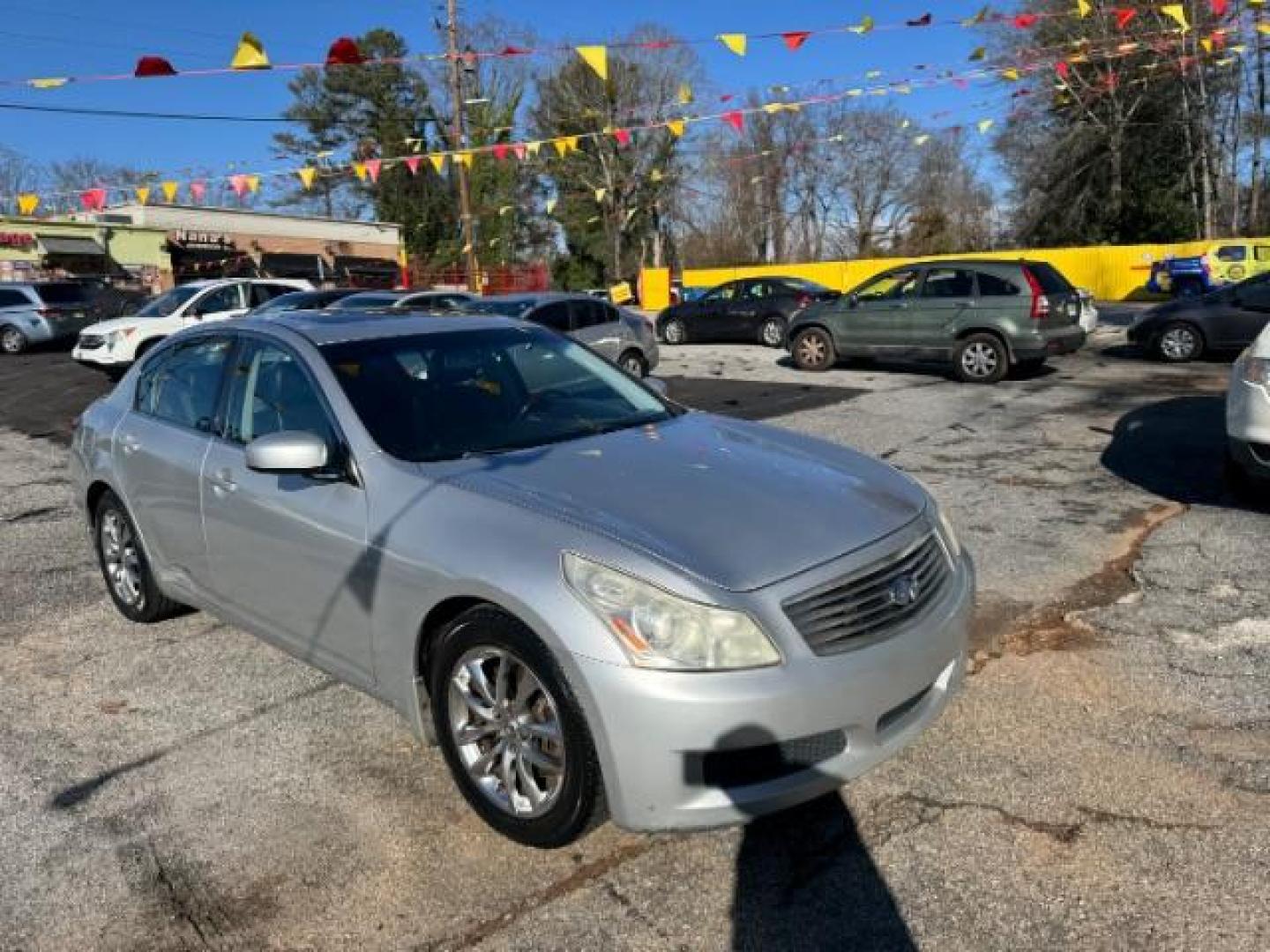 2008 Silver Infiniti G35 Journey (JNKBV61E58M) with an 3.5L V6 DOHC 24V engine, 5-Speed Automatic transmission, located at 1806 Veterans Memorial Hwy SW, Austell, GA, 30168, (770) 944-9558, 33.817959, -84.606987 - Photo#3