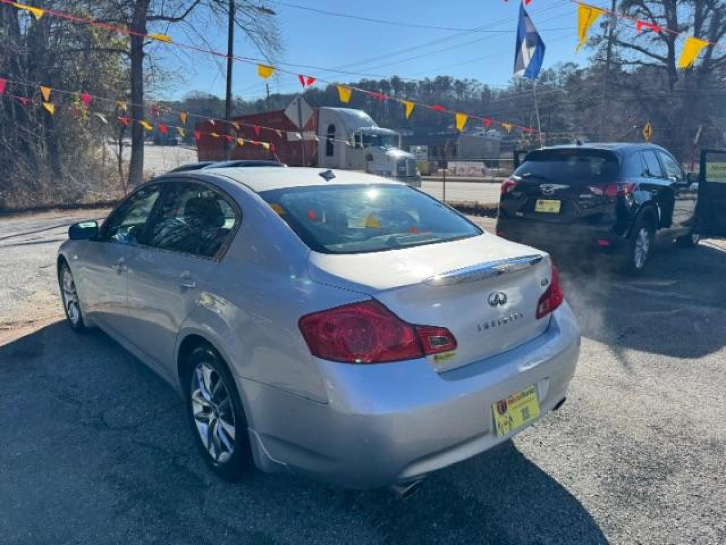 2008 Silver Infiniti G35 Journey (JNKBV61E58M) with an 3.5L V6 DOHC 24V engine, 5-Speed Automatic transmission, located at 1806 Veterans Memorial Hwy SW, Austell, GA, 30168, (770) 944-9558, 33.817959, -84.606987 - Photo#5