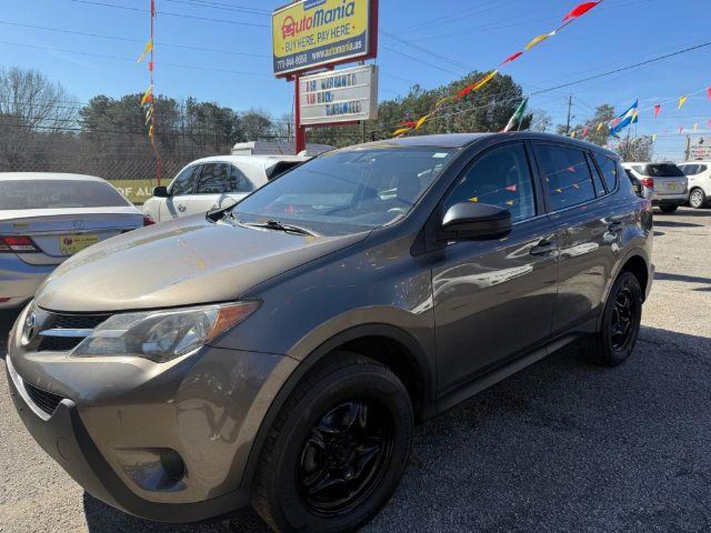 2015 Gray Toyota RAV4 LE FWD (2T3ZFREV6FW) with an 2.5L L4 DOHC 16V engine, 6-Speed Automatic transmission, located at 1806 Veterans Memorial Hwy SW, Austell, GA, 30168, (770) 944-9558, 33.817959, -84.606987 - Photo#0