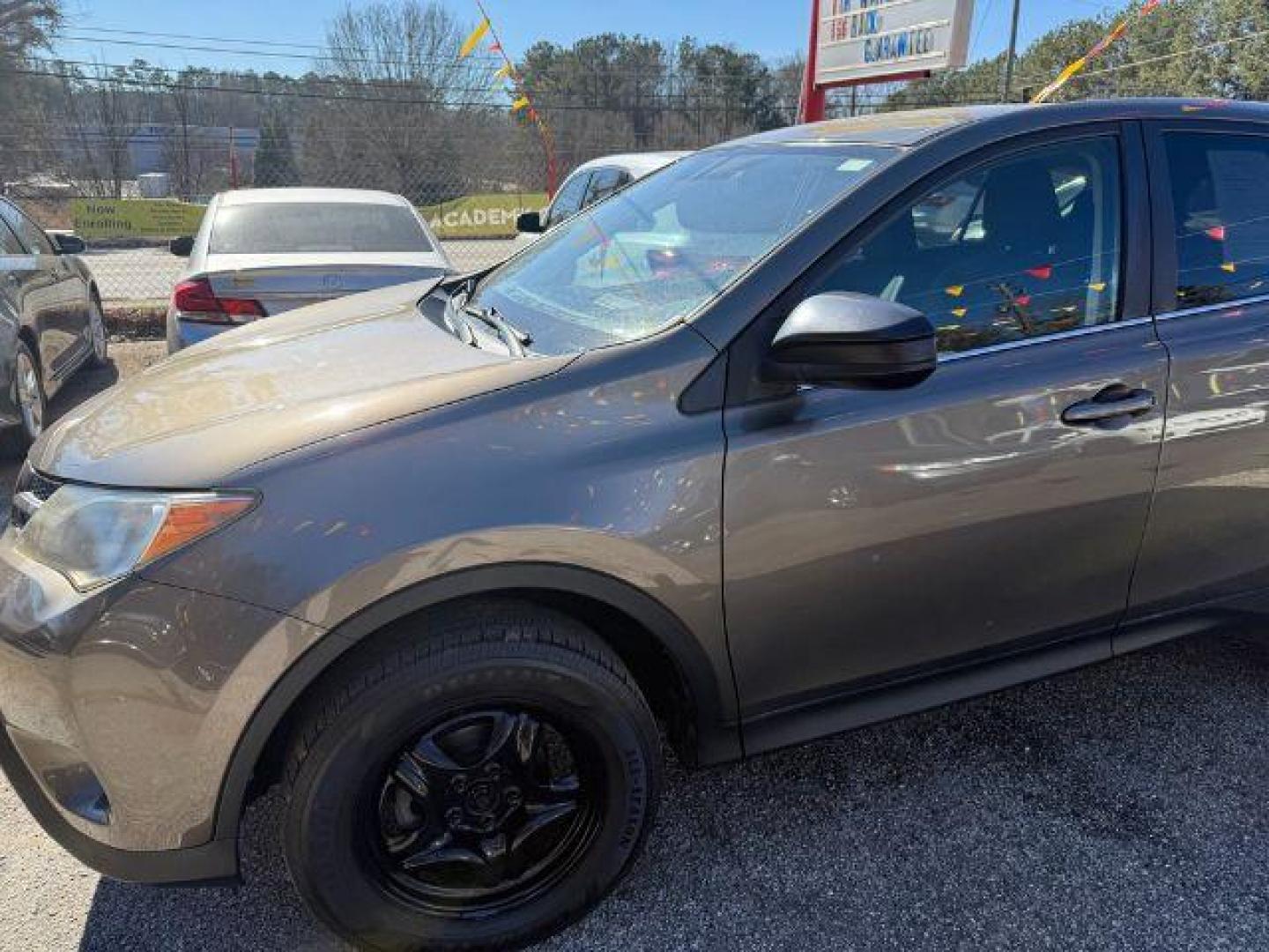 2015 Gray Toyota RAV4 LE FWD (2T3ZFREV6FW) with an 2.5L L4 DOHC 16V engine, 6-Speed Automatic transmission, located at 1806 Veterans Memorial Hwy SW, Austell, GA, 30168, (770) 944-9558, 33.817959, -84.606987 - Photo#1