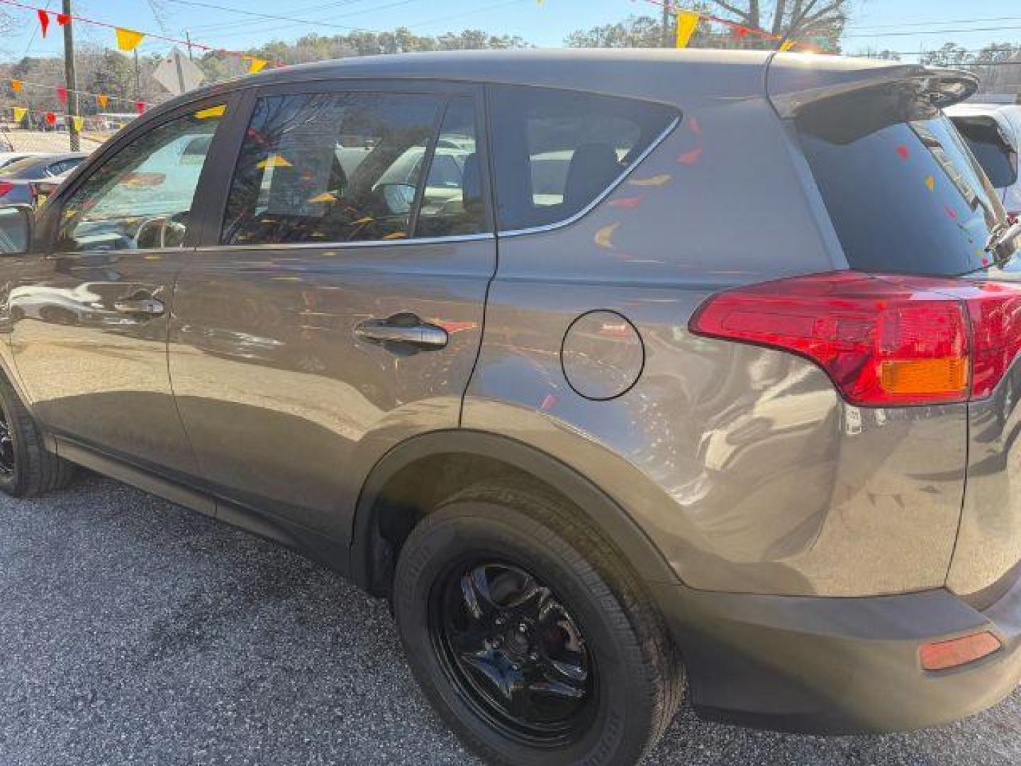 2015 Gray Toyota RAV4 LE FWD (2T3ZFREV6FW) with an 2.5L L4 DOHC 16V engine, 6-Speed Automatic transmission, located at 1806 Veterans Memorial Hwy SW, Austell, GA, 30168, (770) 944-9558, 33.817959, -84.606987 - Photo#2