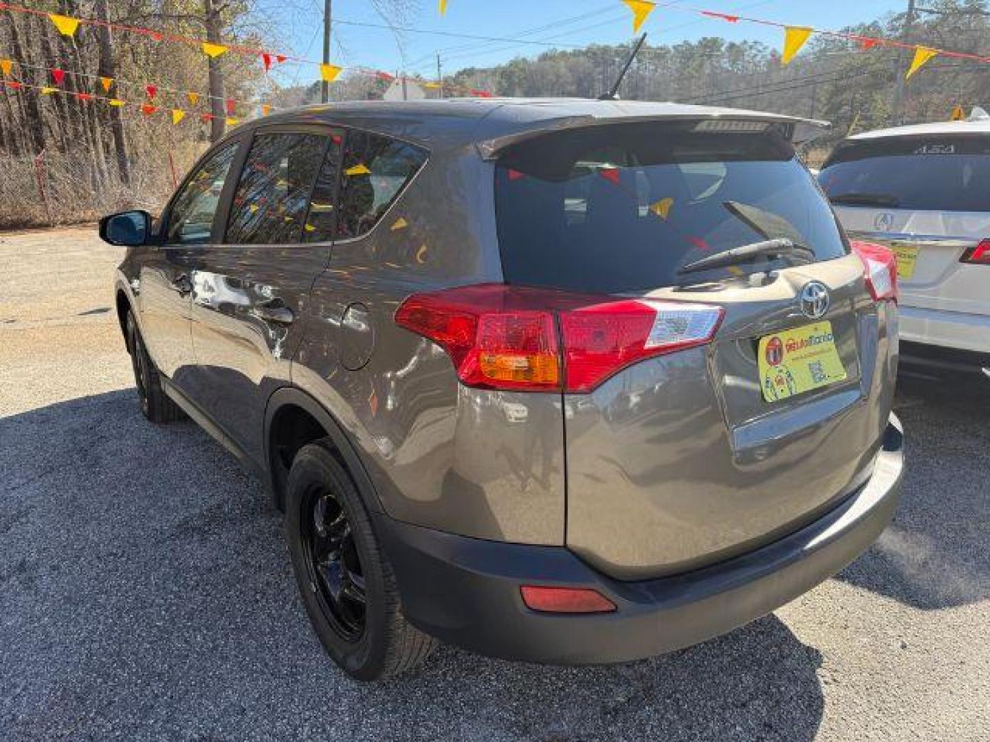 2015 Gray Toyota RAV4 LE FWD (2T3ZFREV6FW) with an 2.5L L4 DOHC 16V engine, 6-Speed Automatic transmission, located at 1806 Veterans Memorial Hwy SW, Austell, GA, 30168, (770) 944-9558, 33.817959, -84.606987 - Photo#3