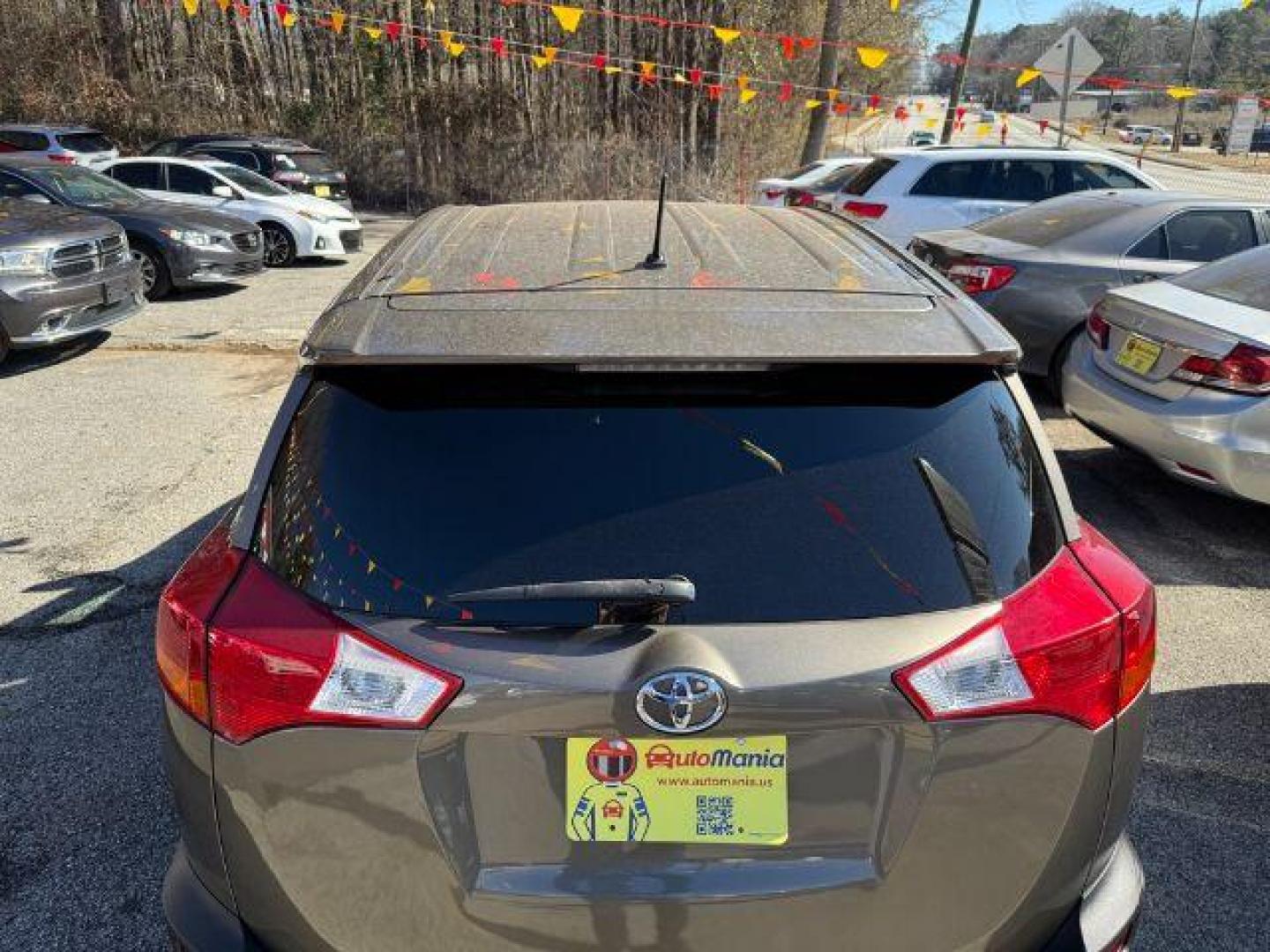 2015 Gray Toyota RAV4 LE FWD (2T3ZFREV6FW) with an 2.5L L4 DOHC 16V engine, 6-Speed Automatic transmission, located at 1806 Veterans Memorial Hwy SW, Austell, GA, 30168, (770) 944-9558, 33.817959, -84.606987 - Photo#4