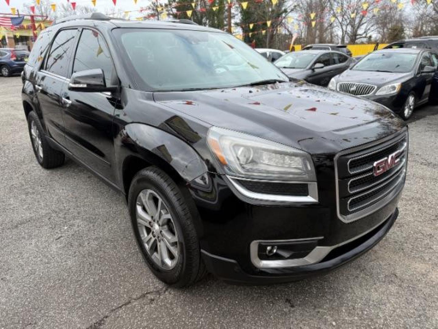 2016 Black GMC Acadia SLT-1 FWD (1GKKRRKD6GJ) with an 3.6L V6 DOHC 24V engine, 6-Speed Automatic transmission, located at 1806 Veterans Memorial Hwy SW, Austell, GA, 30168, (770) 944-9558, 33.817959, -84.606987 - Photo#9