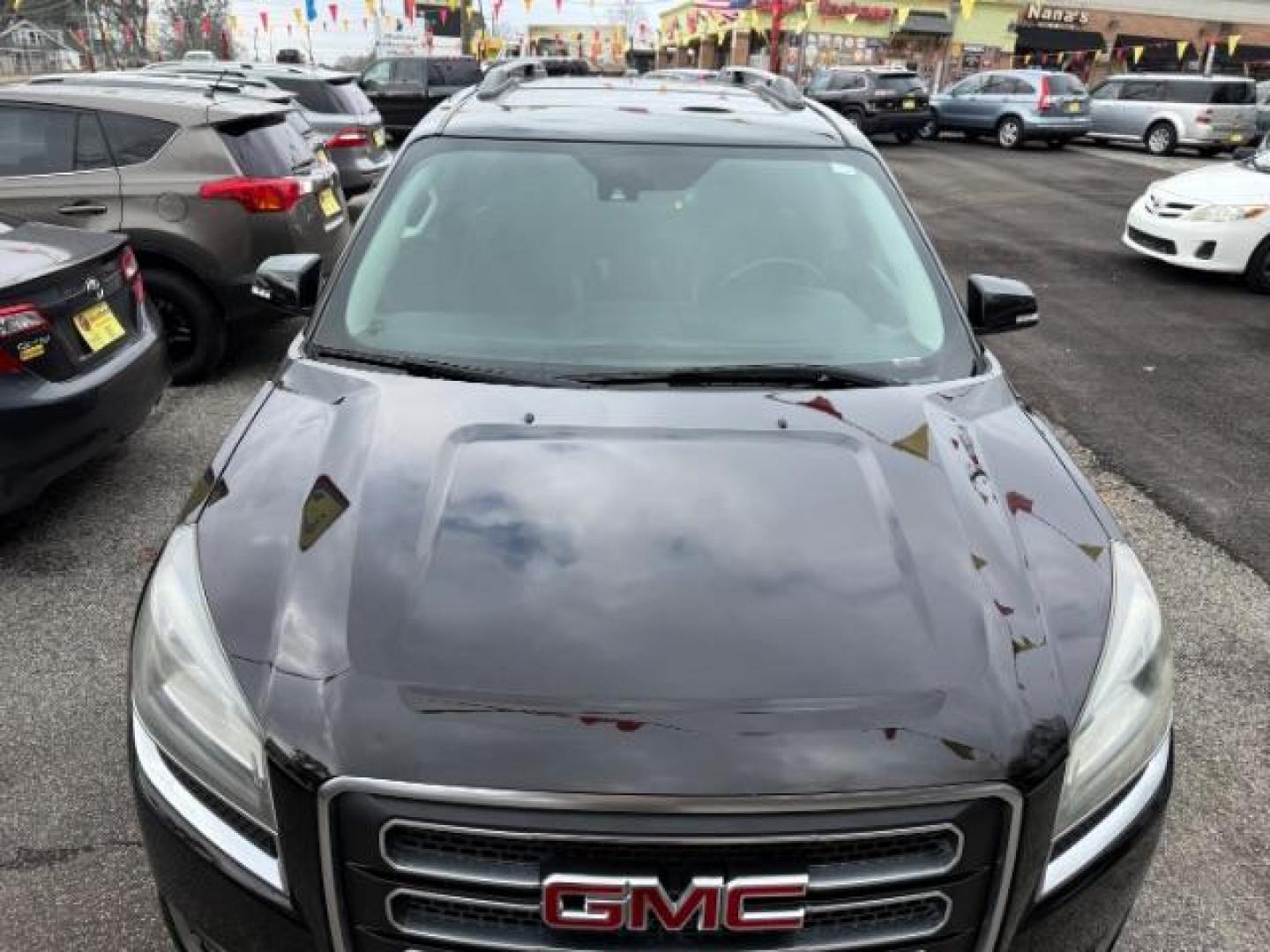 2016 Black GMC Acadia SLT-1 FWD (1GKKRRKD6GJ) with an 3.6L V6 DOHC 24V engine, 6-Speed Automatic transmission, located at 1806 Veterans Memorial Hwy SW, Austell, GA, 30168, (770) 944-9558, 33.817959, -84.606987 - Photo#10