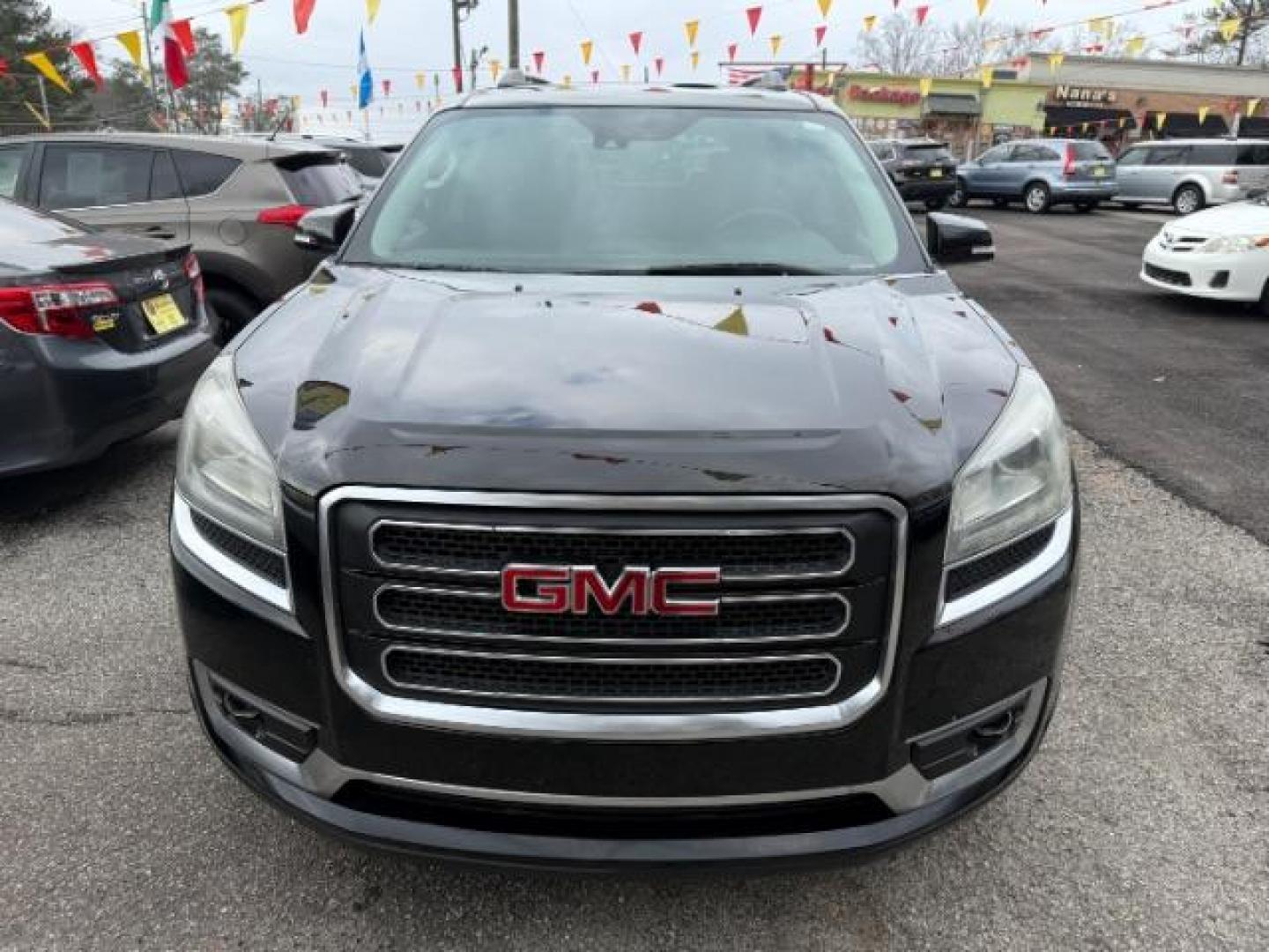 2016 Black GMC Acadia SLT-1 FWD (1GKKRRKD6GJ) with an 3.6L V6 DOHC 24V engine, 6-Speed Automatic transmission, located at 1806 Veterans Memorial Hwy SW, Austell, GA, 30168, (770) 944-9558, 33.817959, -84.606987 - Photo#12