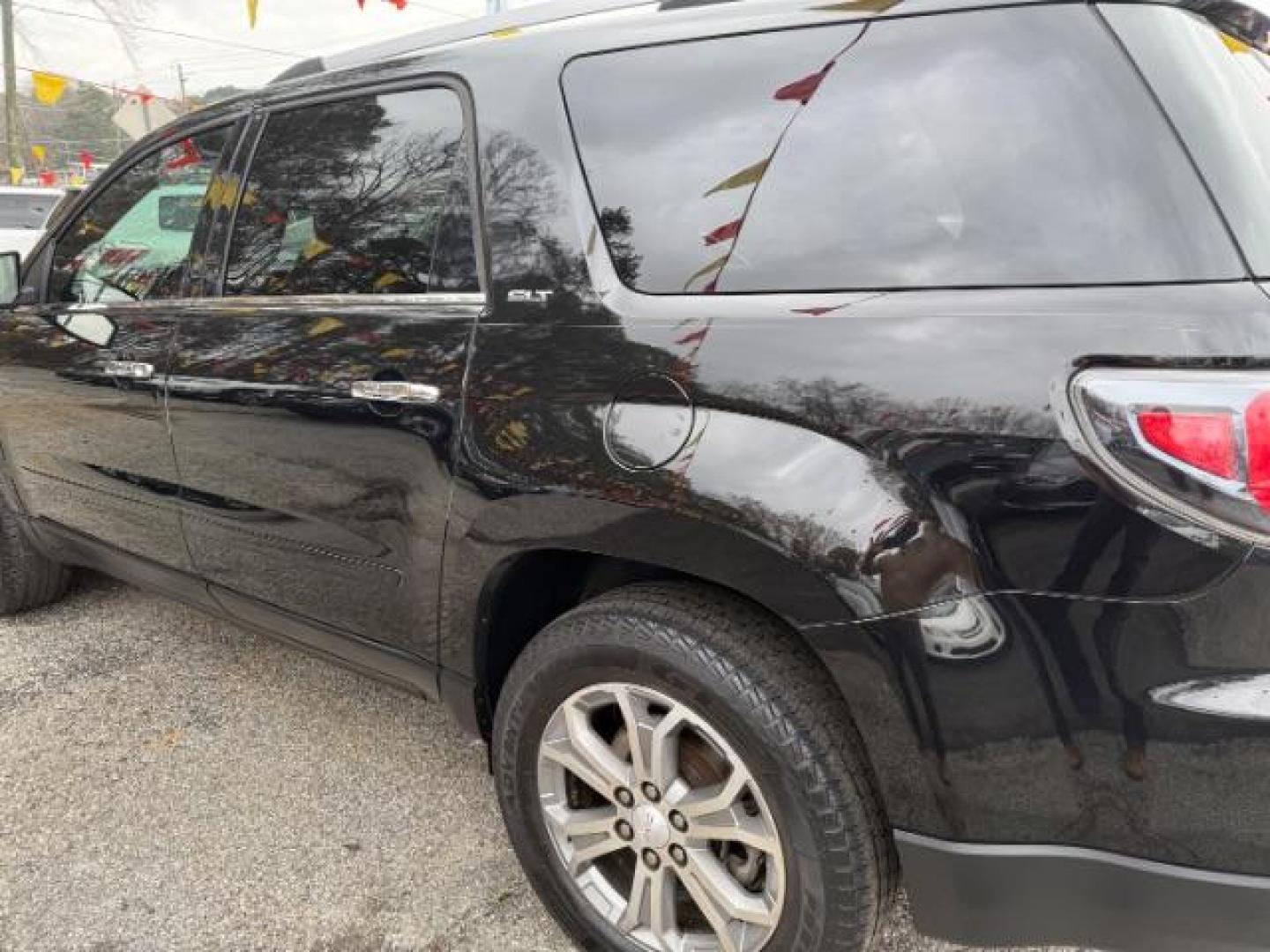 2016 Black GMC Acadia SLT-1 FWD (1GKKRRKD6GJ) with an 3.6L V6 DOHC 24V engine, 6-Speed Automatic transmission, located at 1806 Veterans Memorial Hwy SW, Austell, GA, 30168, (770) 944-9558, 33.817959, -84.606987 - Photo#1