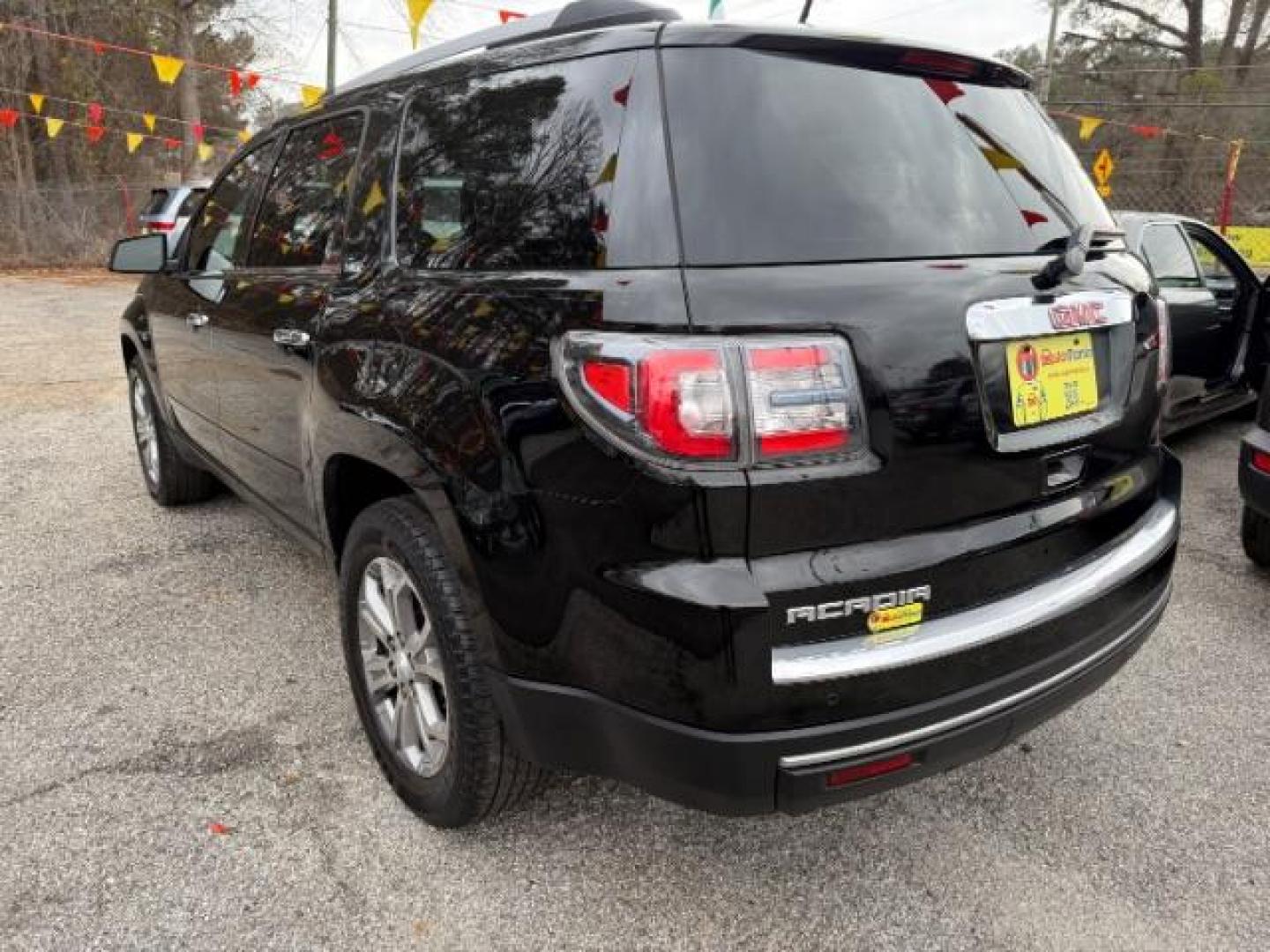 2016 Black GMC Acadia SLT-1 FWD (1GKKRRKD6GJ) with an 3.6L V6 DOHC 24V engine, 6-Speed Automatic transmission, located at 1806 Veterans Memorial Hwy SW, Austell, GA, 30168, (770) 944-9558, 33.817959, -84.606987 - Photo#2