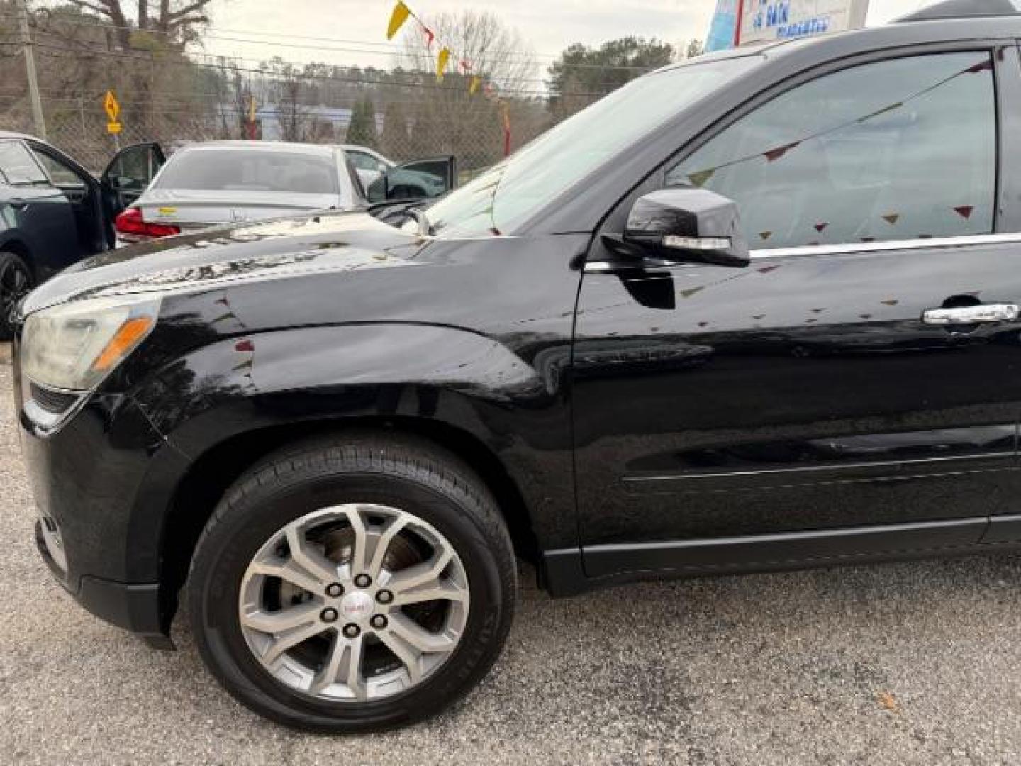 2016 Black GMC Acadia SLT-1 FWD (1GKKRRKD6GJ) with an 3.6L V6 DOHC 24V engine, 6-Speed Automatic transmission, located at 1806 Veterans Memorial Hwy SW, Austell, GA, 30168, (770) 944-9558, 33.817959, -84.606987 - Photo#3