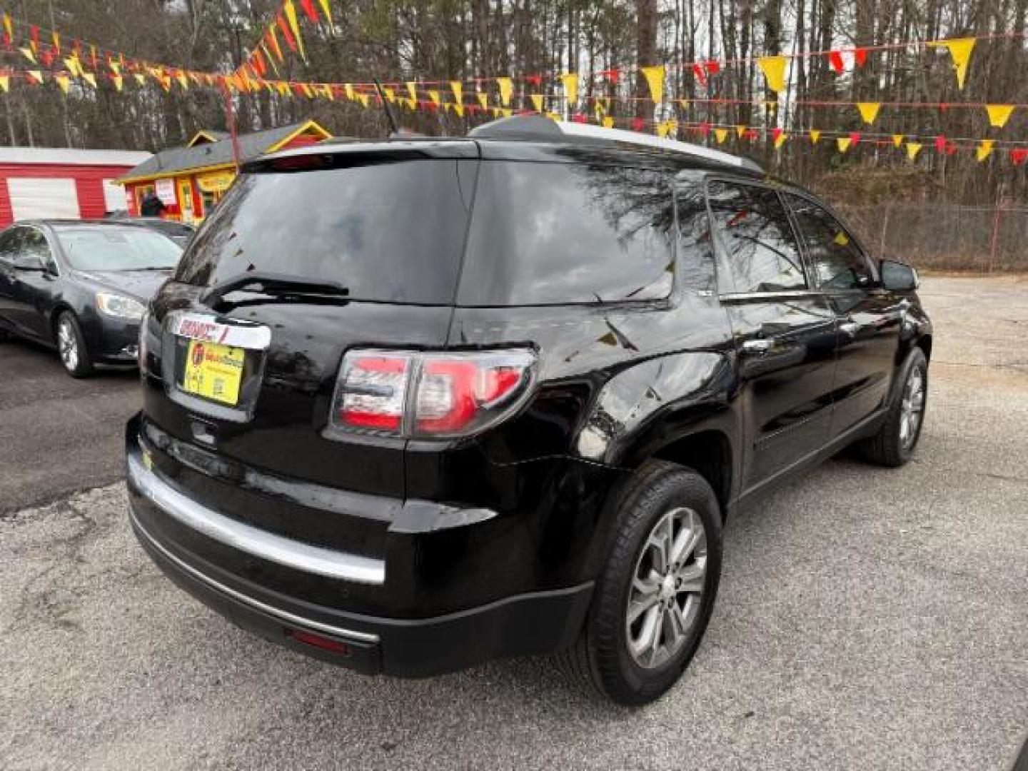 2016 Black GMC Acadia SLT-1 FWD (1GKKRRKD6GJ) with an 3.6L V6 DOHC 24V engine, 6-Speed Automatic transmission, located at 1806 Veterans Memorial Hwy SW, Austell, GA, 30168, (770) 944-9558, 33.817959, -84.606987 - Photo#6