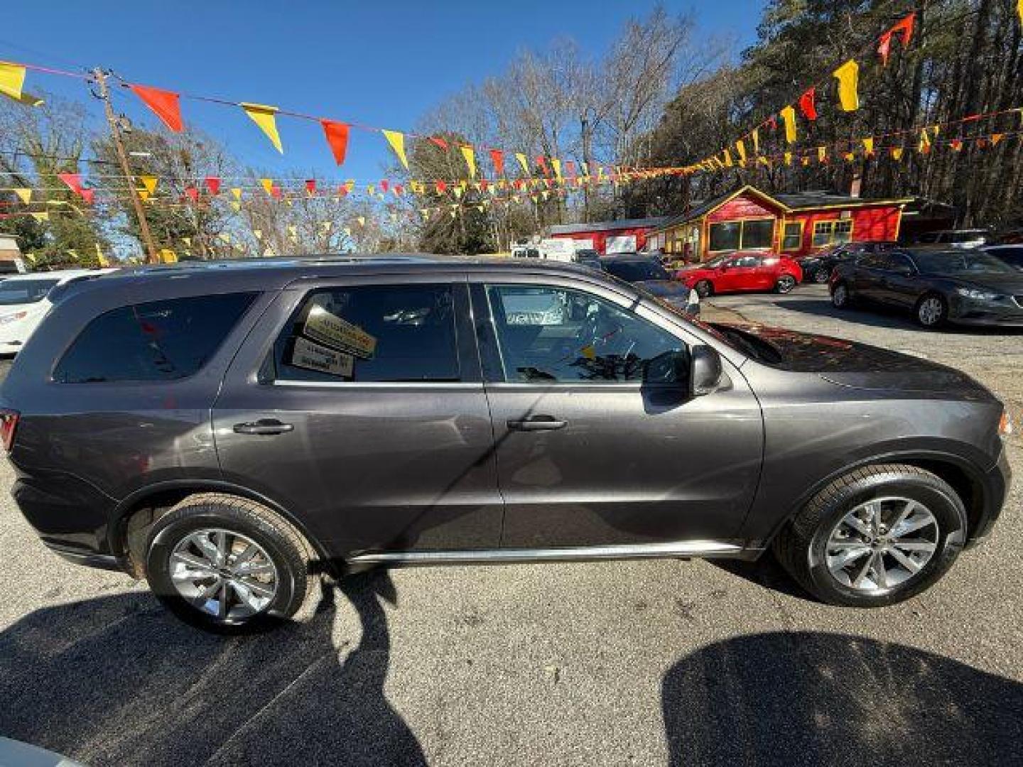 2015 Gray Dodge Durango Limited 2WD (1C4RDHDG7FC) with an 3.6L V6 DOHC 24V engine, 8-Speed Automatic transmission, located at 1806 Veterans Memorial Hwy SW, Austell, GA, 30168, (770) 944-9558, 33.817959, -84.606987 - Photo#8