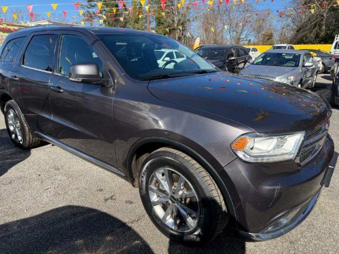 2015 Gray Dodge Durango Limited 2WD (1C4RDHDG7FC) with an 3.6L V6 DOHC 24V engine, 8-Speed Automatic transmission, located at 1806 Veterans Memorial Hwy SW, Austell, GA, 30168, (770) 944-9558, 33.817959, -84.606987 - Photo#9