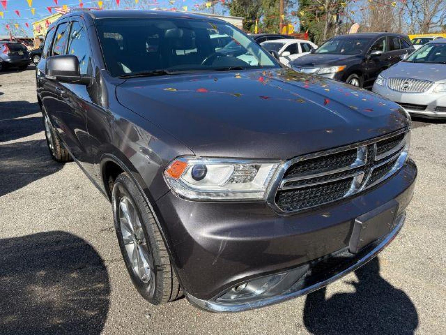 2015 Gray Dodge Durango Limited 2WD (1C4RDHDG7FC) with an 3.6L V6 DOHC 24V engine, 8-Speed Automatic transmission, located at 1806 Veterans Memorial Hwy SW, Austell, GA, 30168, (770) 944-9558, 33.817959, -84.606987 - Photo#10