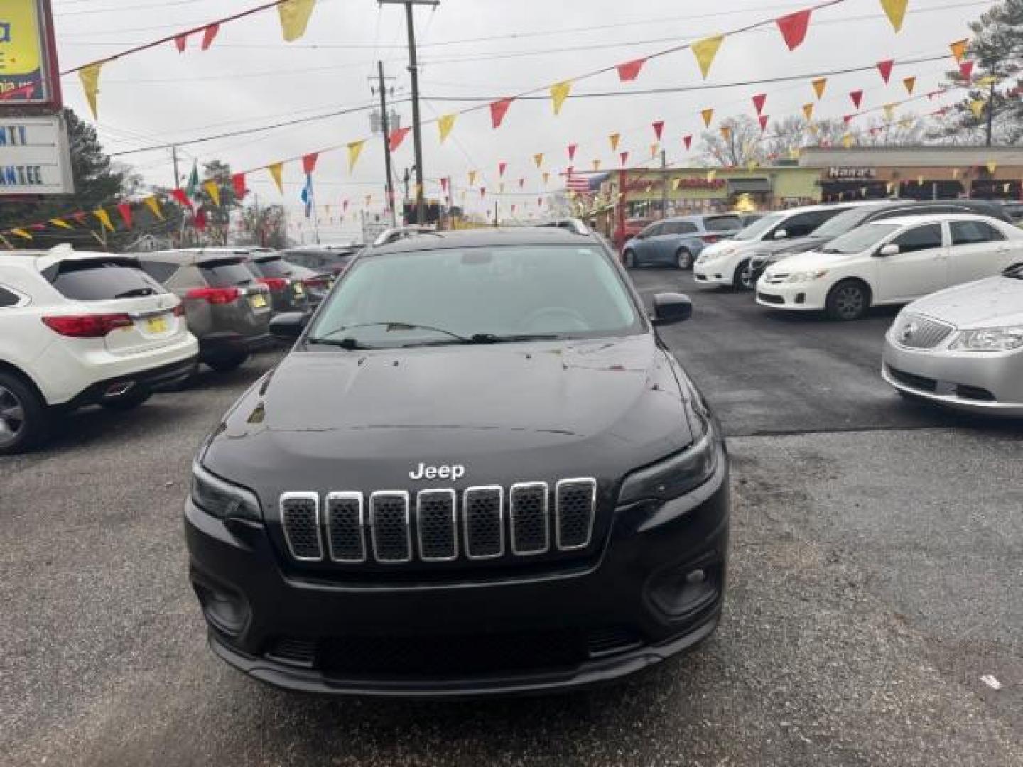 2019 Black Jeep Cherokee Latitude FWD (1C4PJLCB1KD) with an 2.4L L4 DOHC 16V engine, 9-Speed Automatic transmission, located at 1806 Veterans Memorial Hwy SW, Austell, GA, 30168, (770) 944-9558, 33.817959, -84.606987 - Photo#0