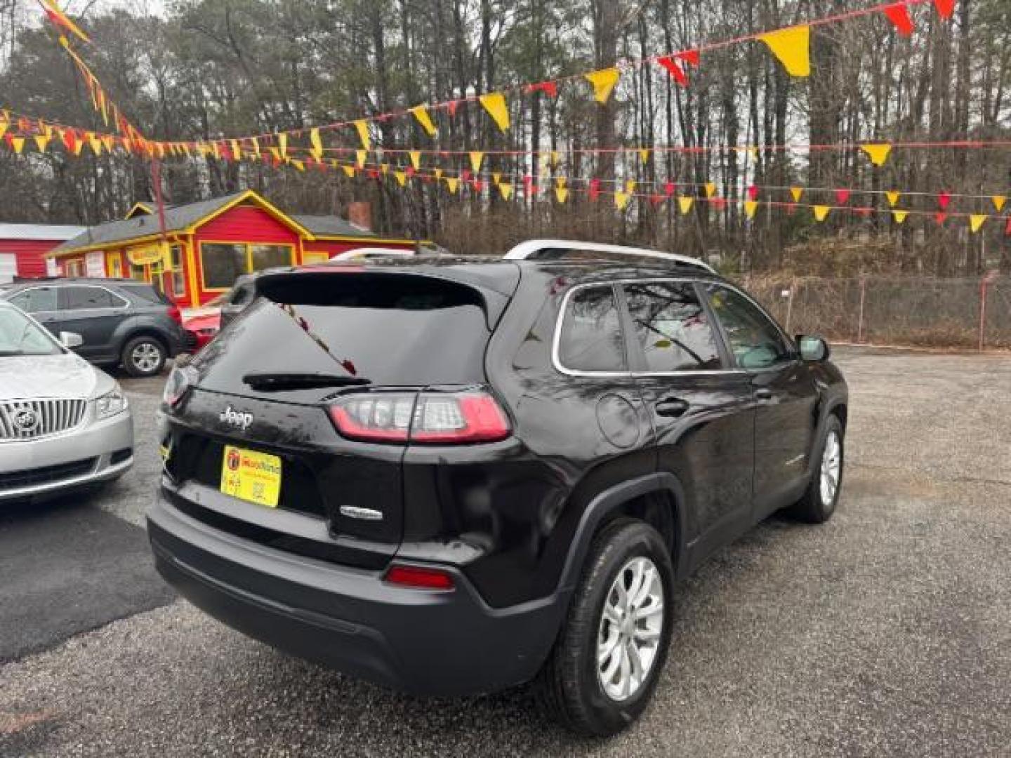 2019 Black Jeep Cherokee Latitude FWD (1C4PJLCB1KD) with an 2.4L L4 DOHC 16V engine, 9-Speed Automatic transmission, located at 1806 Veterans Memorial Hwy SW, Austell, GA, 30168, (770) 944-9558, 33.817959, -84.606987 - Photo#3