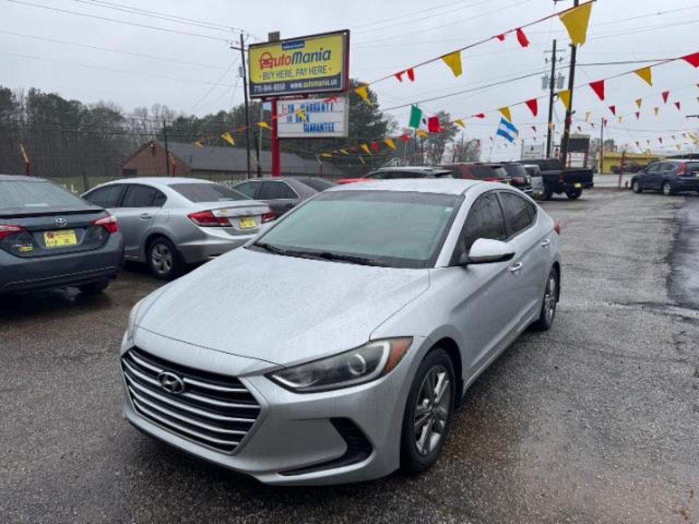 2018 Silver Hyundai Elantra SE (KMHD84LF9JU) with an 2.0L I-4 MPI DOHC engine, located at 1806 Veterans Memorial Hwy SW, Austell, GA, 30168, (770) 944-9558, 33.817959, -84.606987 - Photo#0