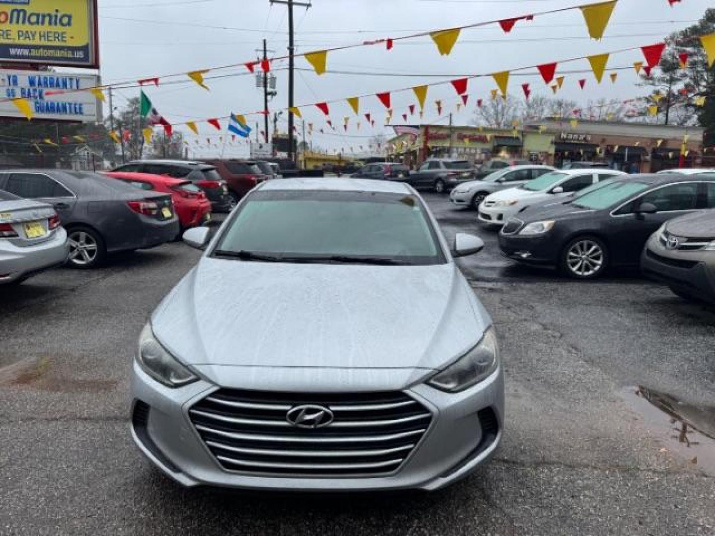 2018 Silver Hyundai Elantra SE (KMHD84LF9JU) with an 2.0L I-4 MPI DOHC engine, located at 1806 Veterans Memorial Hwy SW, Austell, GA, 30168, (770) 944-9558, 33.817959, -84.606987 - Photo#1