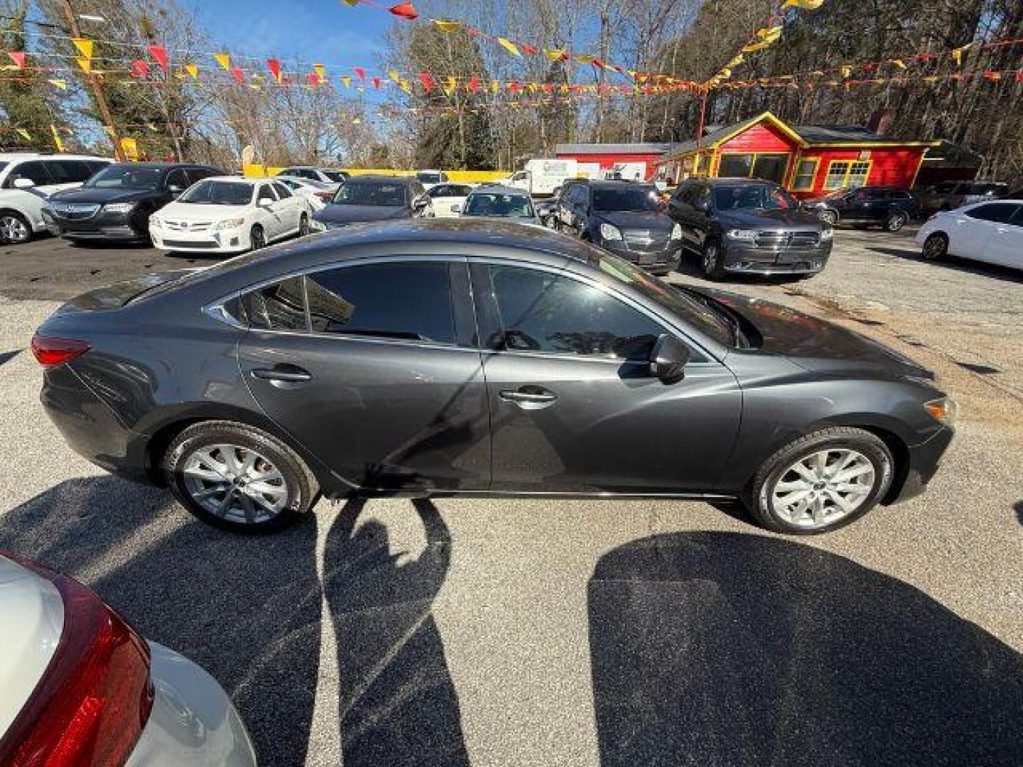 2015 Gray Mazda Mazda 6 i Sport (JM1GJ1U57F1) with an 2.5L I-4 DI DOHC engine, Automatic transmission, located at 1806 Veterans Memorial Hwy SW, Austell, GA, 30168, (770) 944-9558, 33.817959, -84.606987 - Photo#9