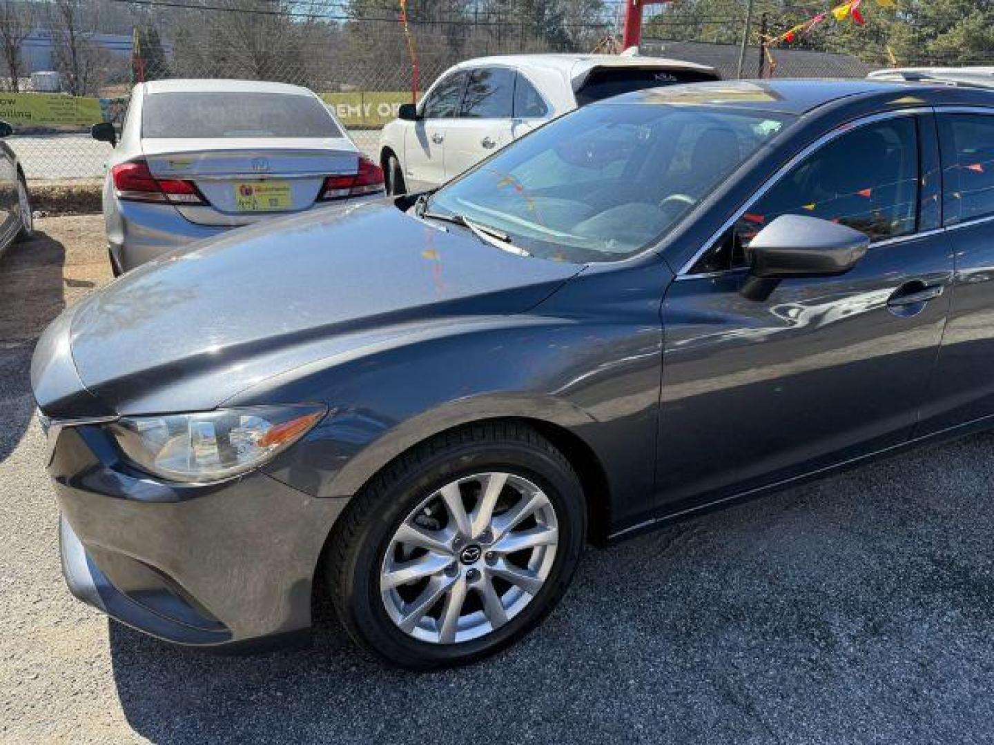 2015 Gray Mazda Mazda 6 i Sport (JM1GJ1U57F1) with an 2.5L I-4 DI DOHC engine, Automatic transmission, located at 1806 Veterans Memorial Hwy SW, Austell, GA, 30168, (770) 944-9558, 33.817959, -84.606987 - Photo#1