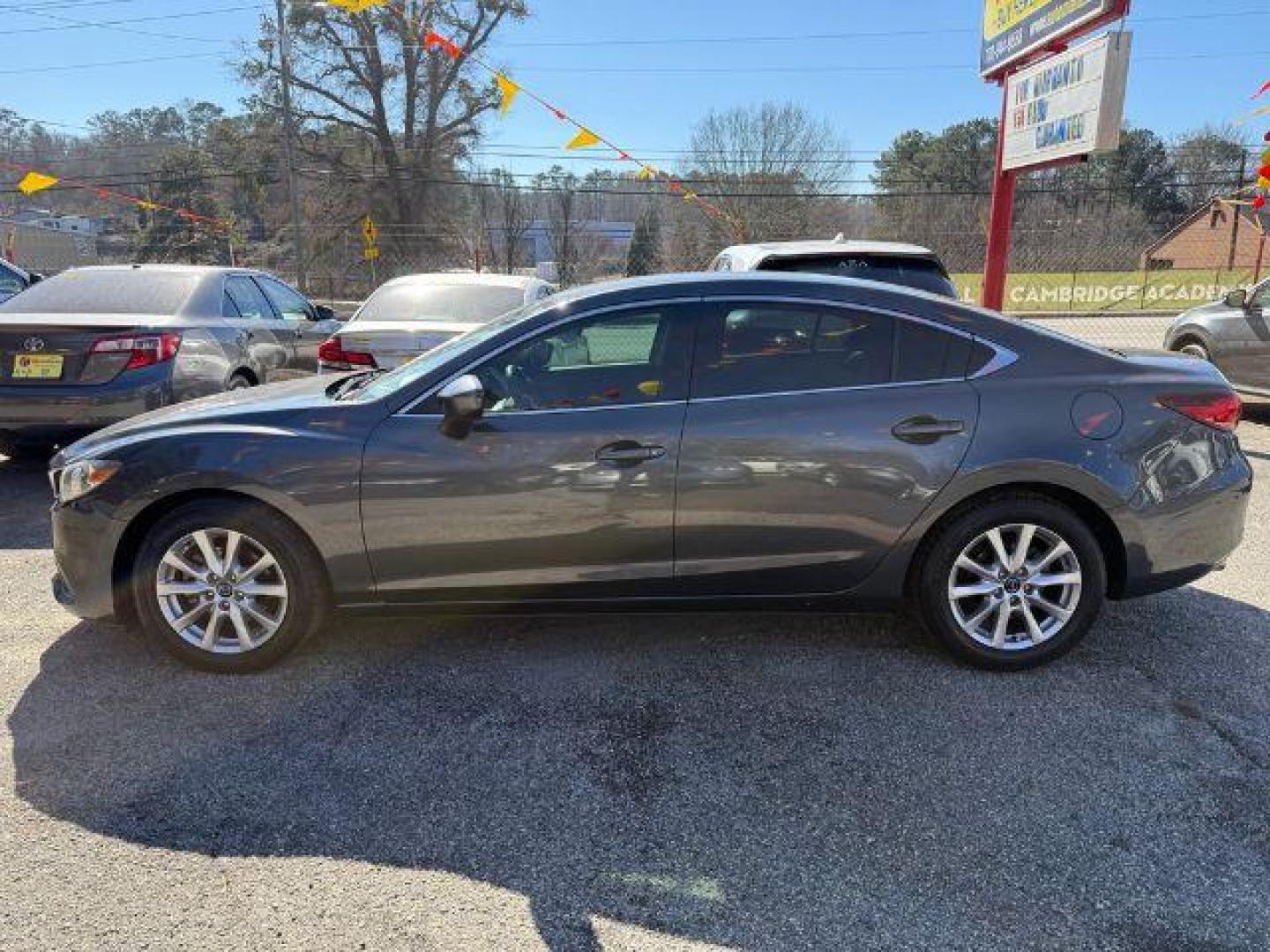 2015 Gray Mazda Mazda 6 i Sport (JM1GJ1U57F1) with an 2.5L I-4 DI DOHC engine, Automatic transmission, located at 1806 Veterans Memorial Hwy SW, Austell, GA, 30168, (770) 944-9558, 33.817959, -84.606987 - Photo#2