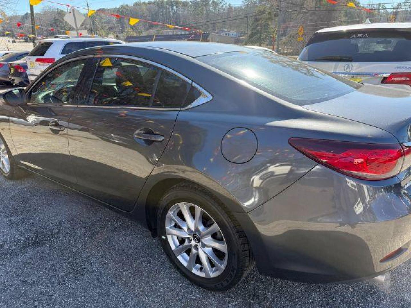 2015 Gray Mazda Mazda 6 i Sport (JM1GJ1U57F1) with an 2.5L I-4 DI DOHC engine, Automatic transmission, located at 1806 Veterans Memorial Hwy SW, Austell, GA, 30168, (770) 944-9558, 33.817959, -84.606987 - Photo#3