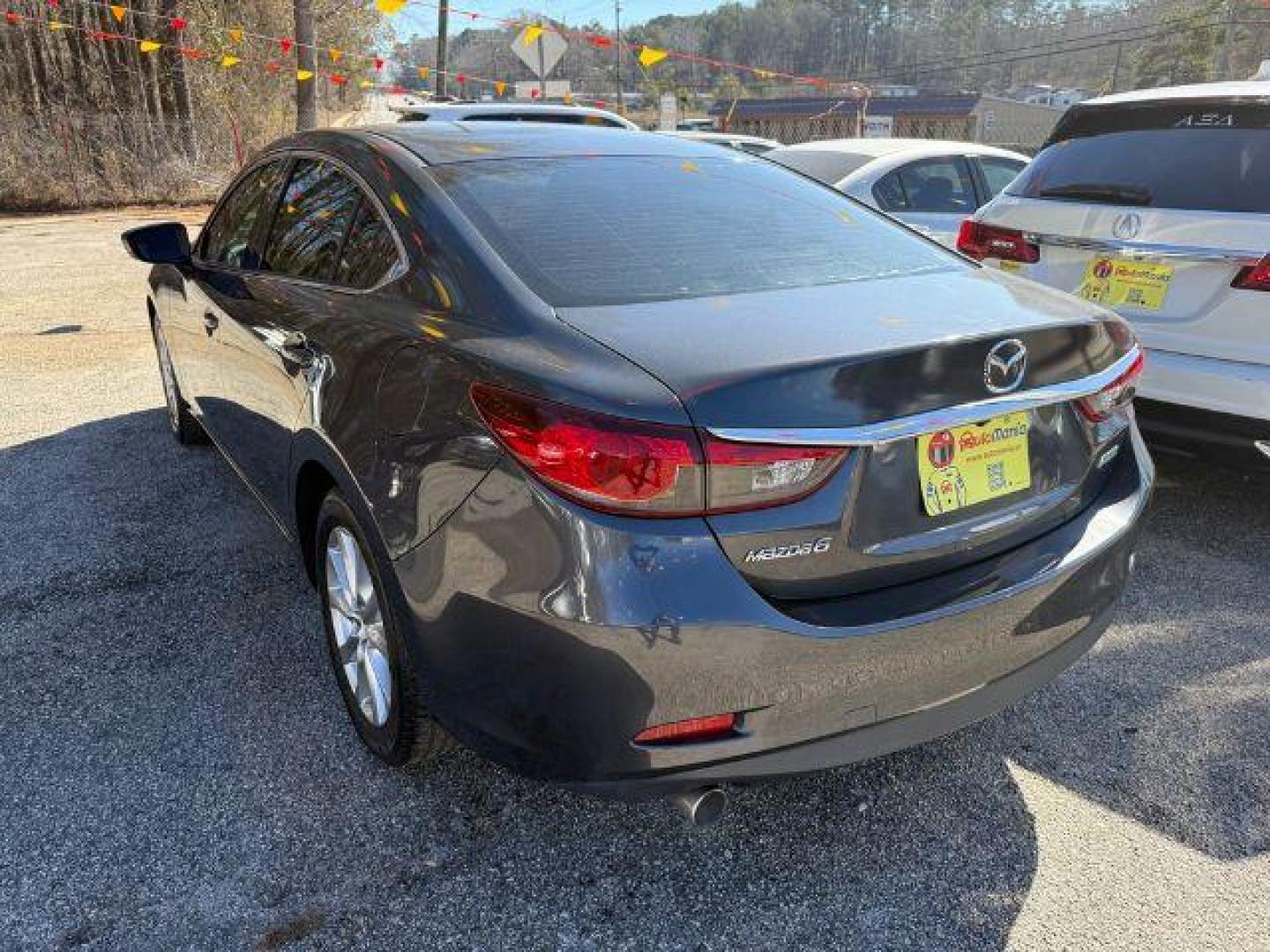 2015 Gray Mazda Mazda 6 i Sport (JM1GJ1U57F1) with an 2.5L I-4 DI DOHC engine, Automatic transmission, located at 1806 Veterans Memorial Hwy SW, Austell, GA, 30168, (770) 944-9558, 33.817959, -84.606987 - Photo#4